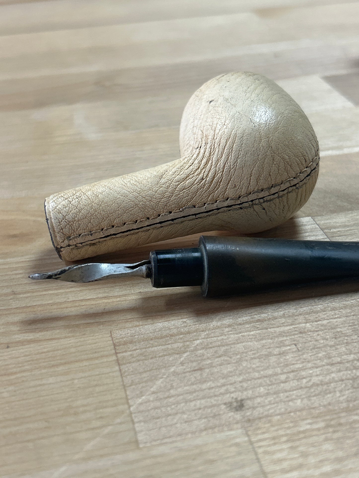 Vintage Longchamp leather pipe ( we don’t know anything about pipes. This may need a cleaning to fully insert mouth piece)