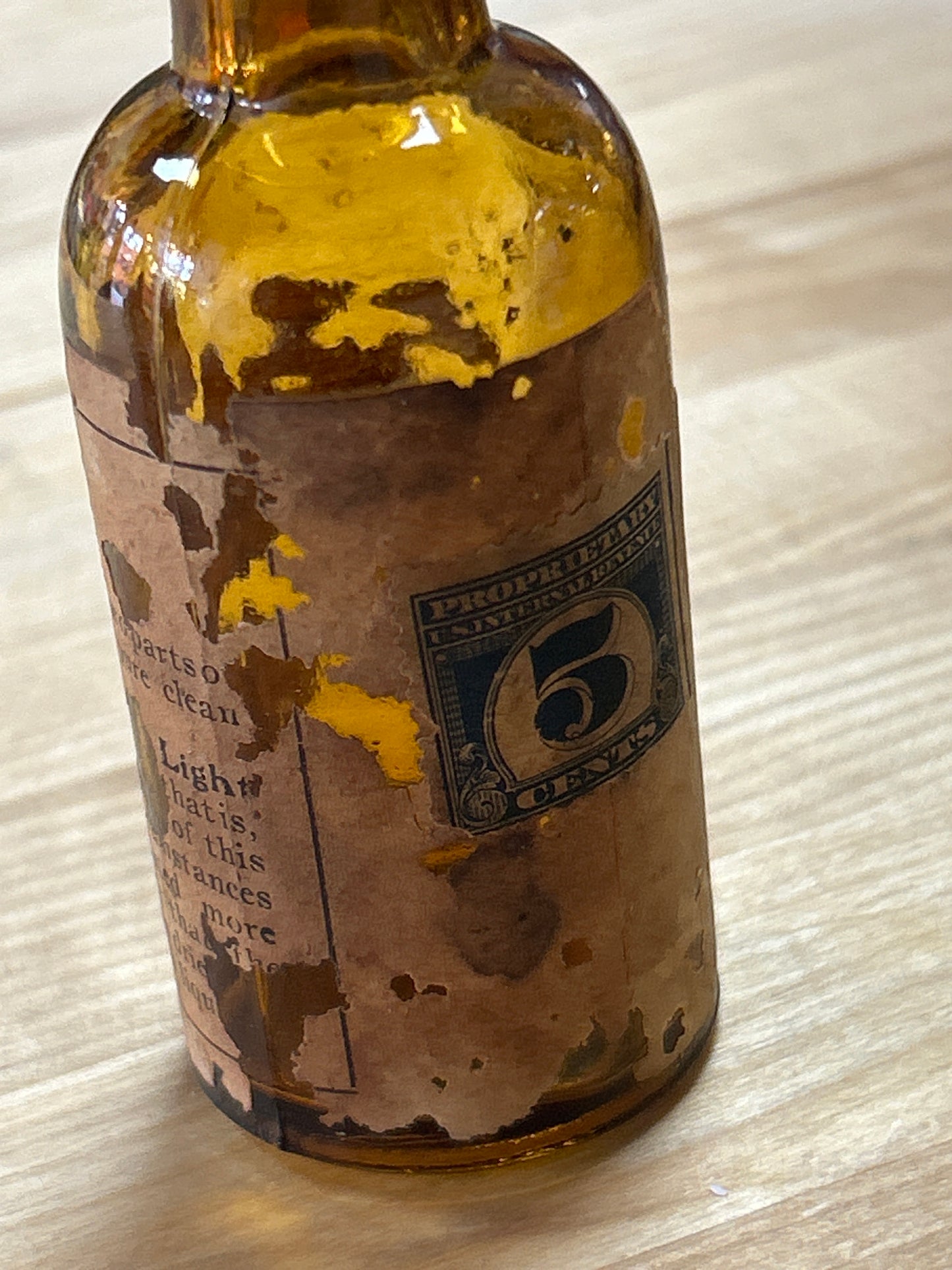 Vintage Hair Ye Bottle 4” (with 5 cent stamp attached)(not sure of maker, partial label)