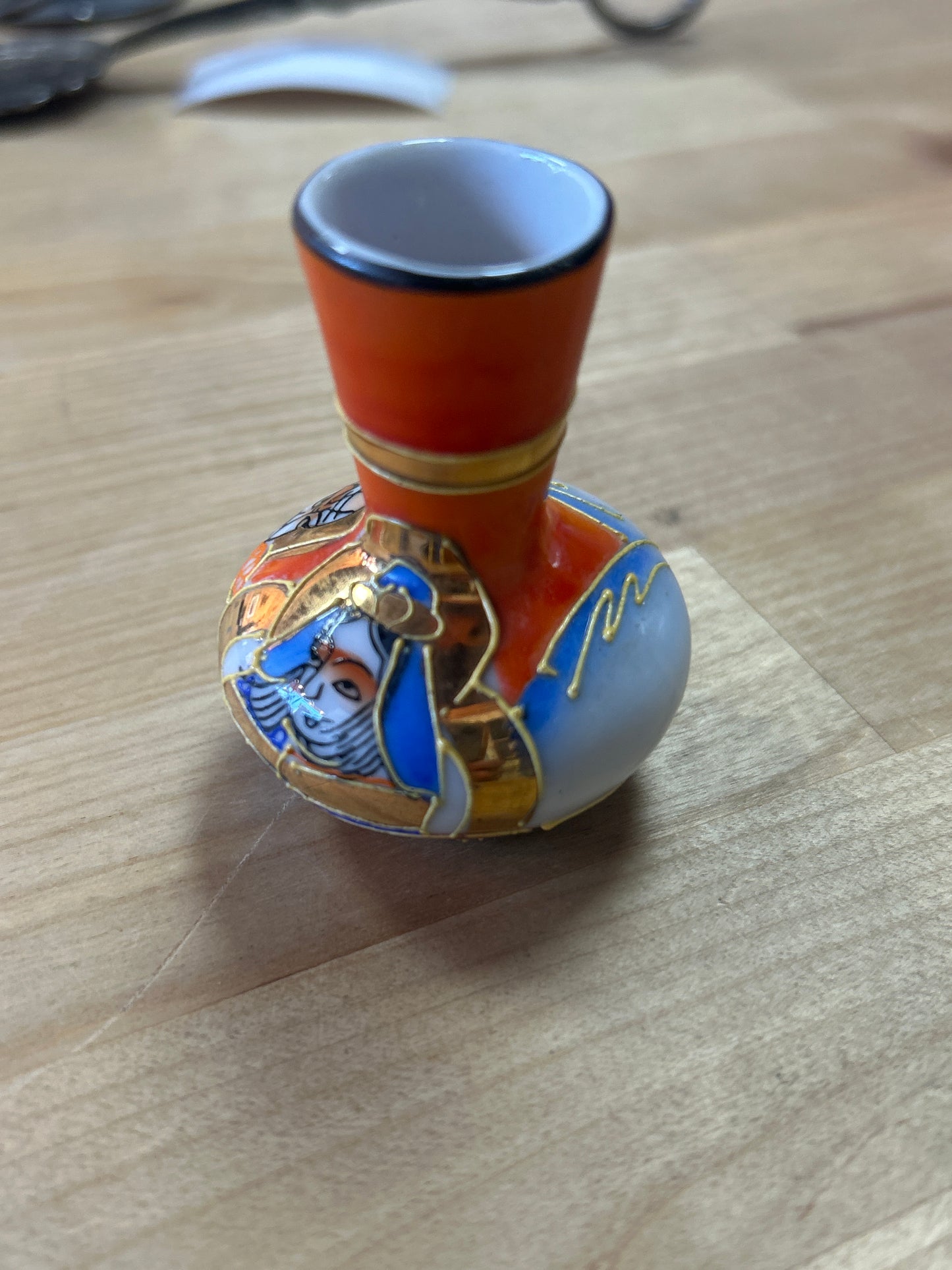 Vintage Japan Ceramic Moriage Bud Vase Hand painted Immortals Raised enamel Gold Accents 2.25” pre owned
