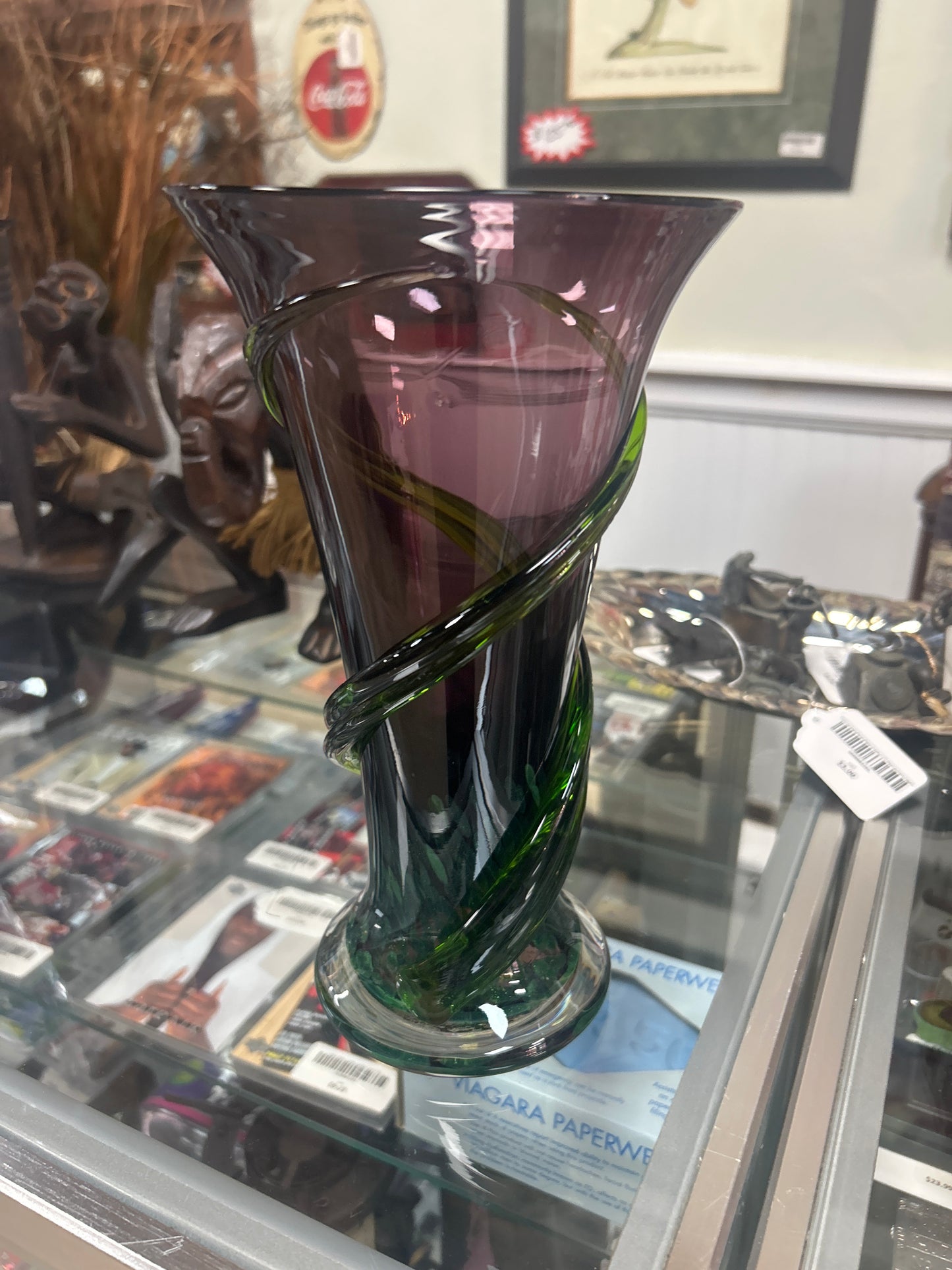 Teleflora piece featuring amethyst purple glass adorned with applied green vine details