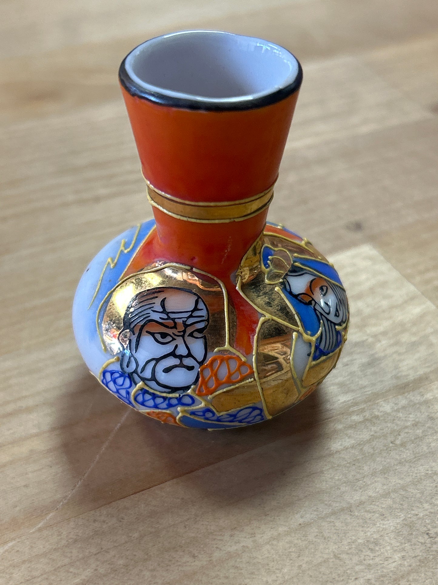 Vintage Japan Ceramic Moriage Bud Vase Hand painted Immortals Raised enamel Gold Accents 2.25” pre owned