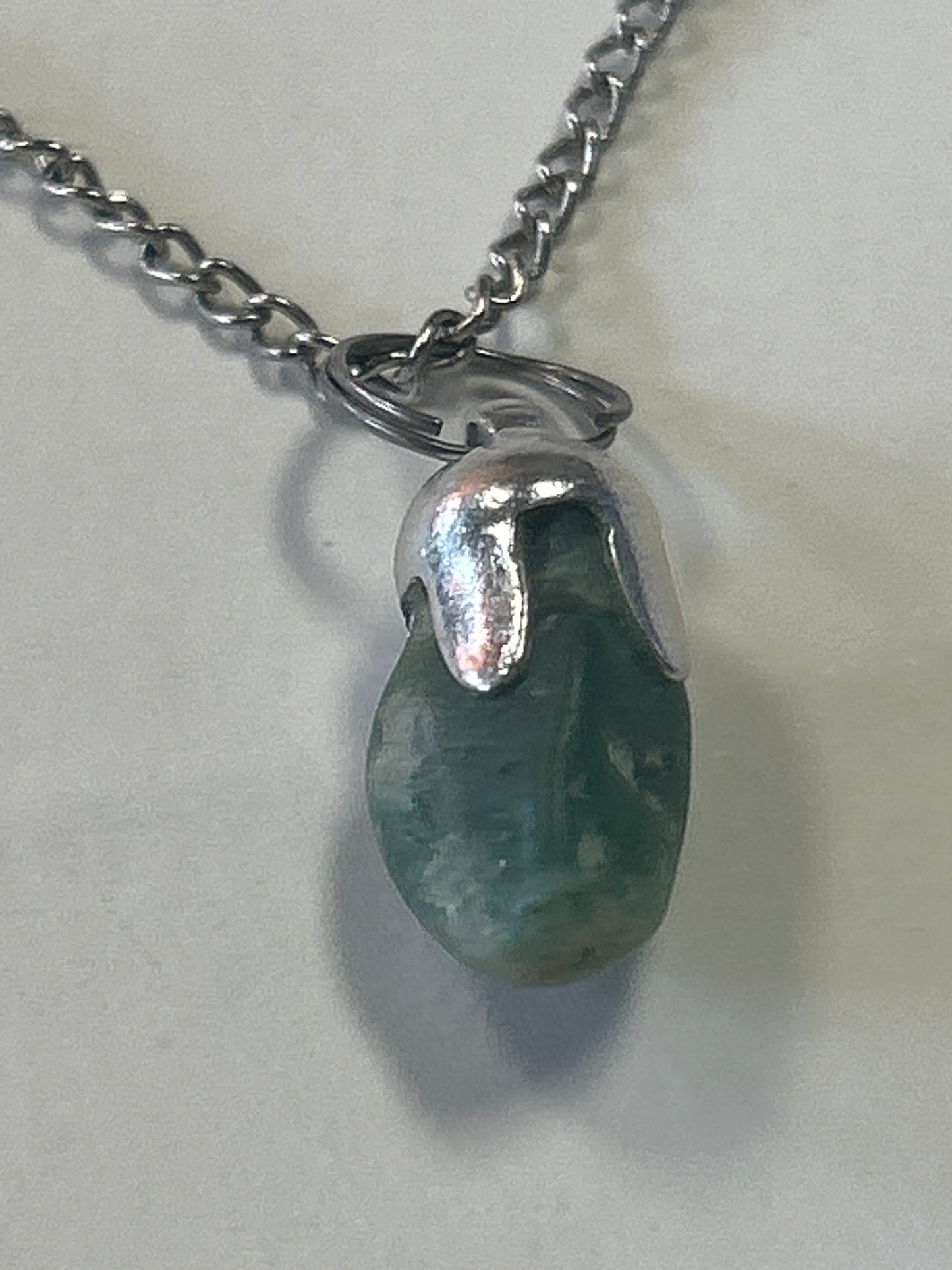 Necklace w/ crystal pendant (or a rock?)