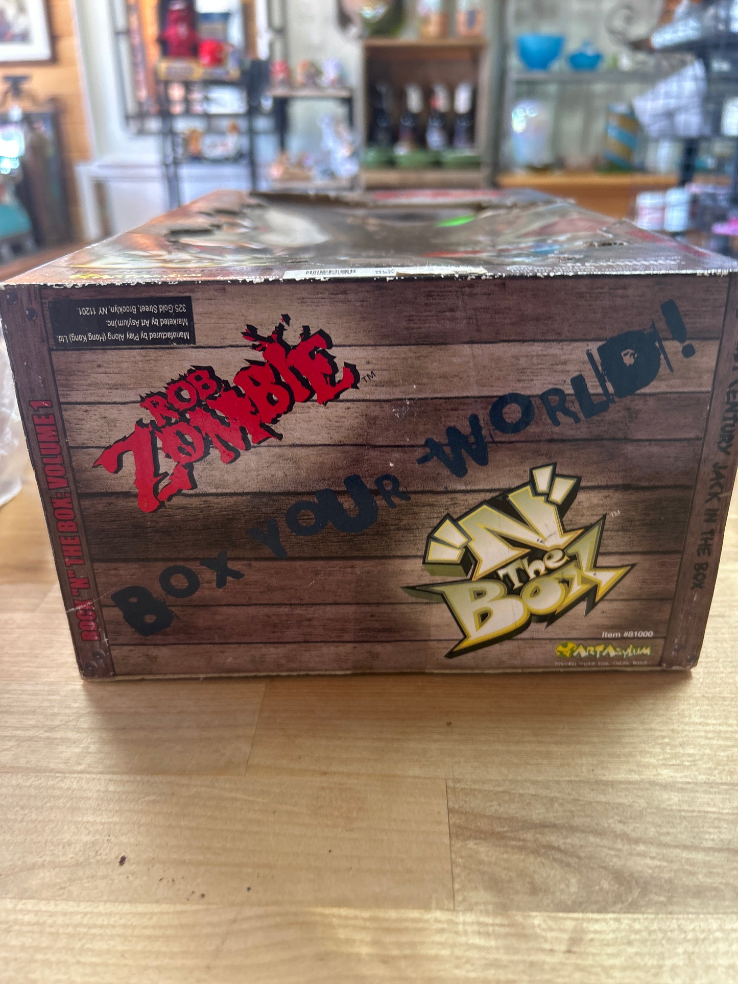 Rock ‘N The Box: Rob Zombie Figure. Box is a little dirty and has a few small tears and creases but it is unopened and sealed with original tape. Working! NIB