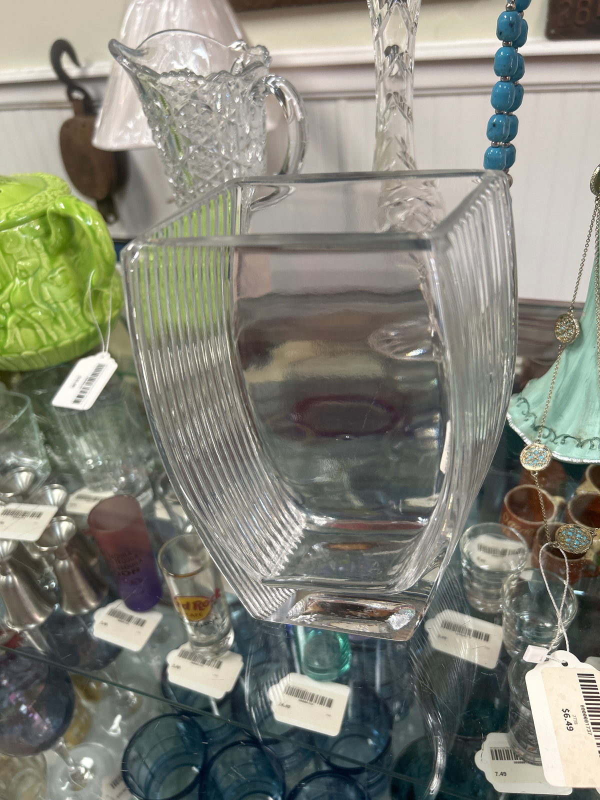Vintage heavy crystal vase rhomboid shaped with grooved lines up both sides
