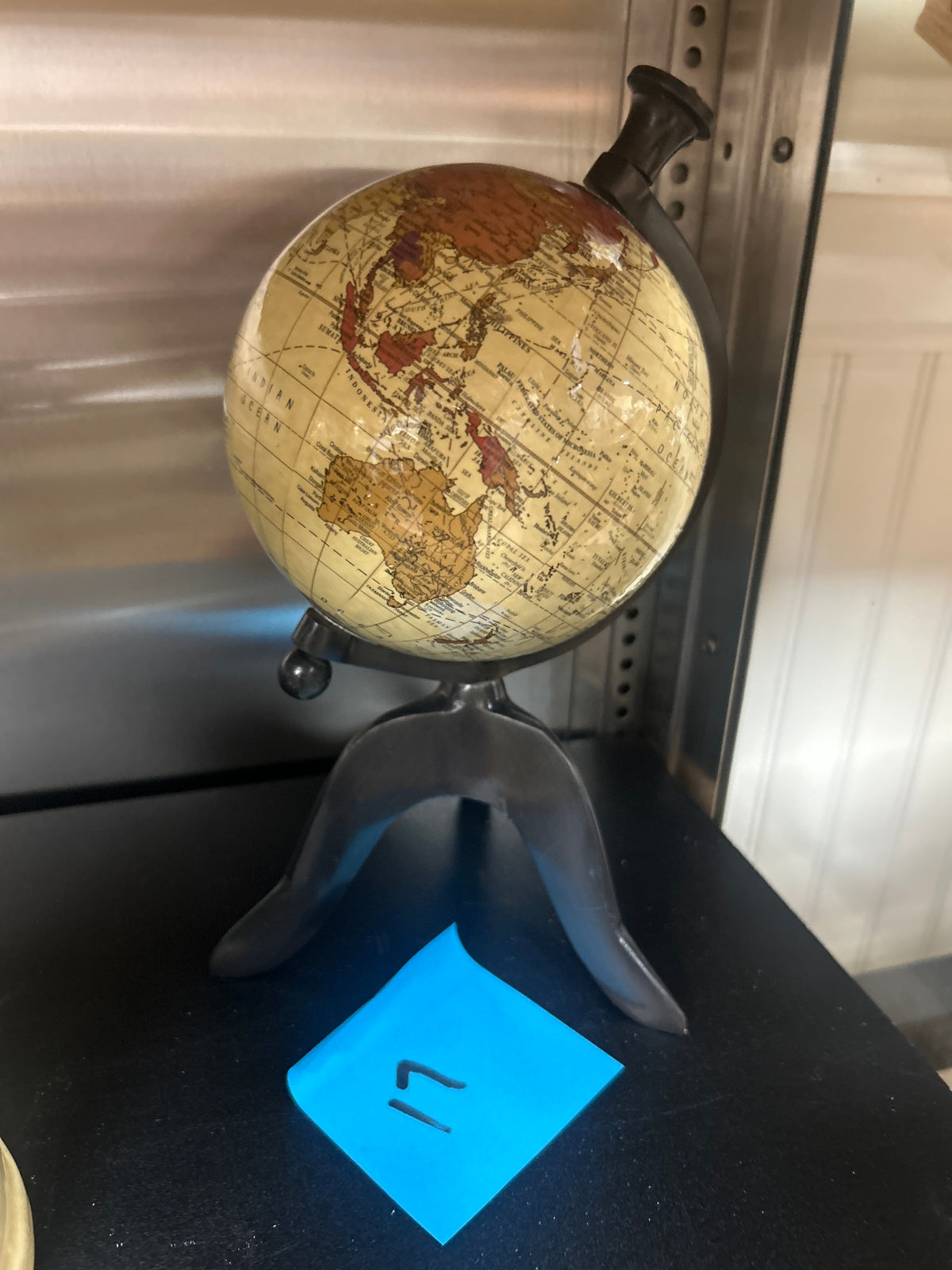 Replogle "Mackie" model 9-inch diameter map on a dark metal tripod stand