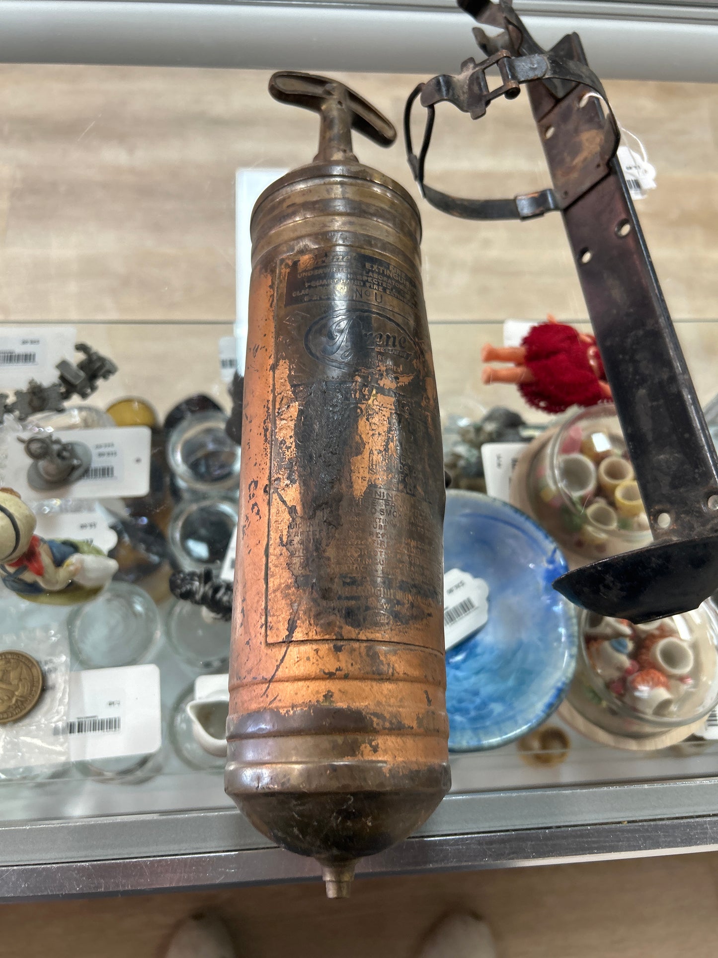 Vintage pump fire extinguisher w/ original wall mount
