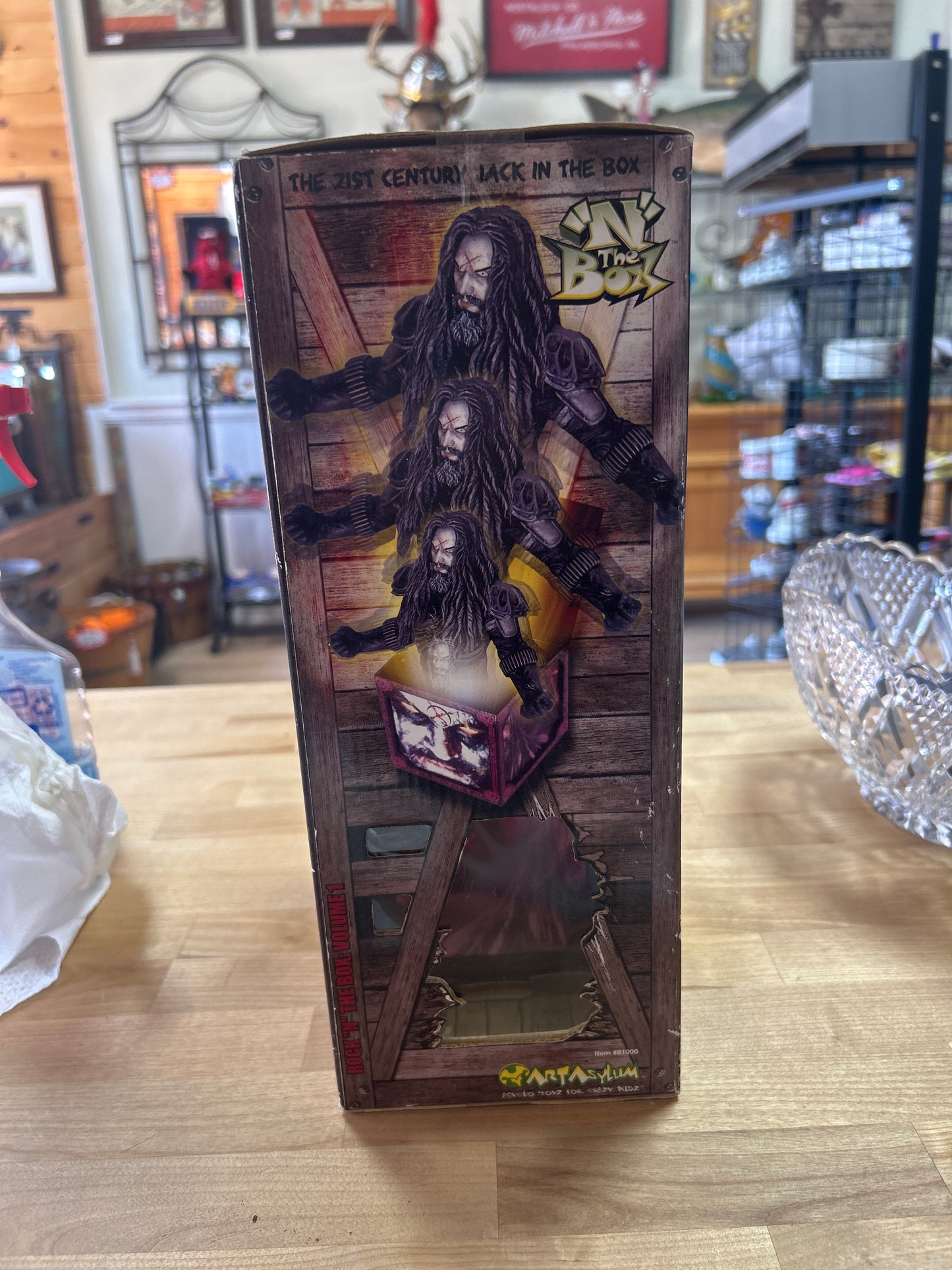 Rock ‘N The Box: Rob Zombie Figure. Box is a little dirty and has a few small tears and creases but it is unopened and sealed with original tape. Working! NIB