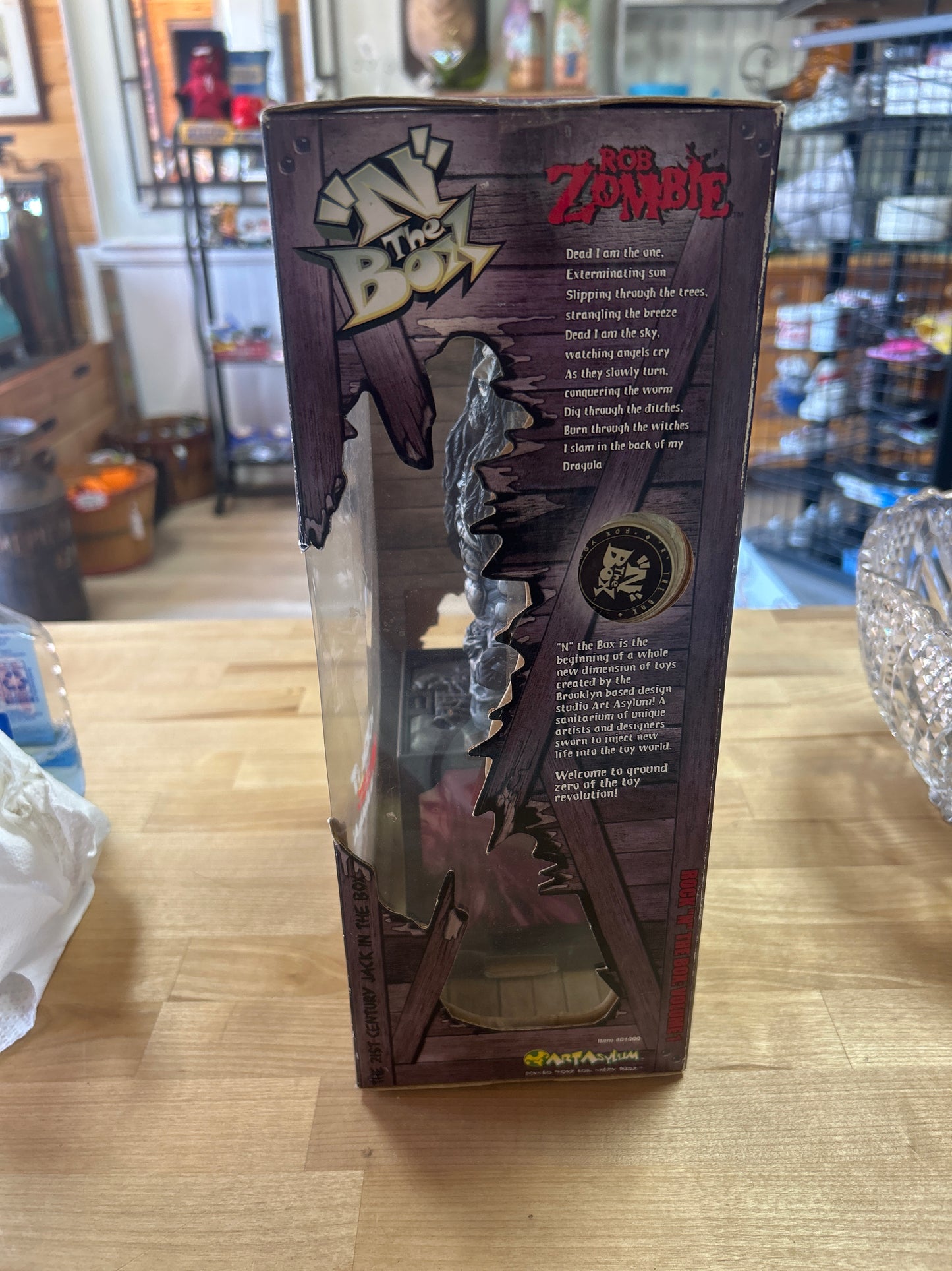 Rock ‘N The Box: Rob Zombie Figure. Box is a little dirty and has a few small tears and creases but it is unopened and sealed with original tape. Working! NIB