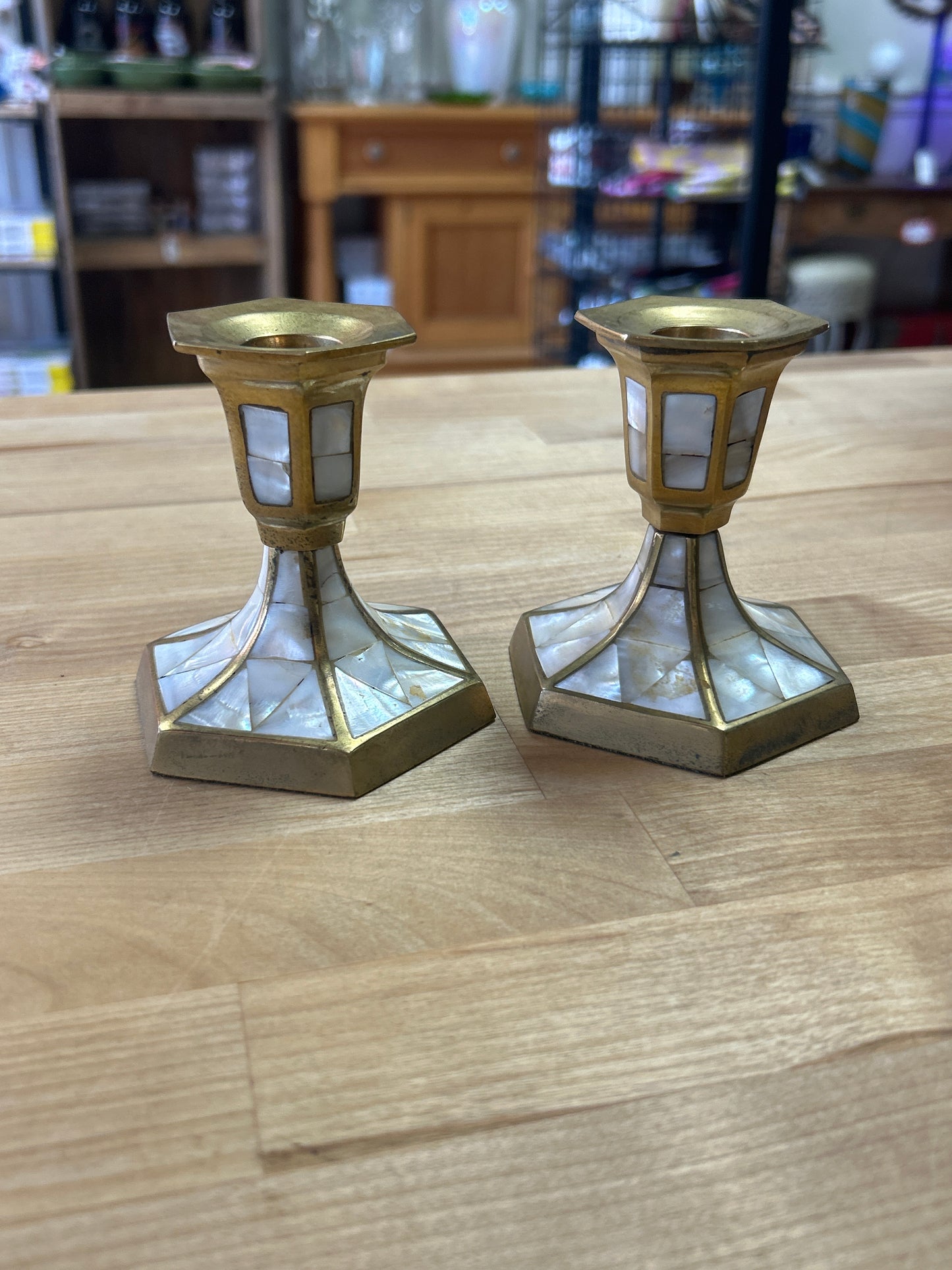 Brass and mother of pearl candle stick holders