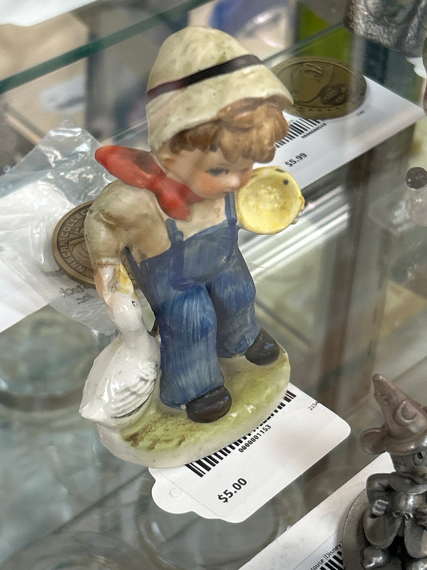 Boy with Goose Figurine