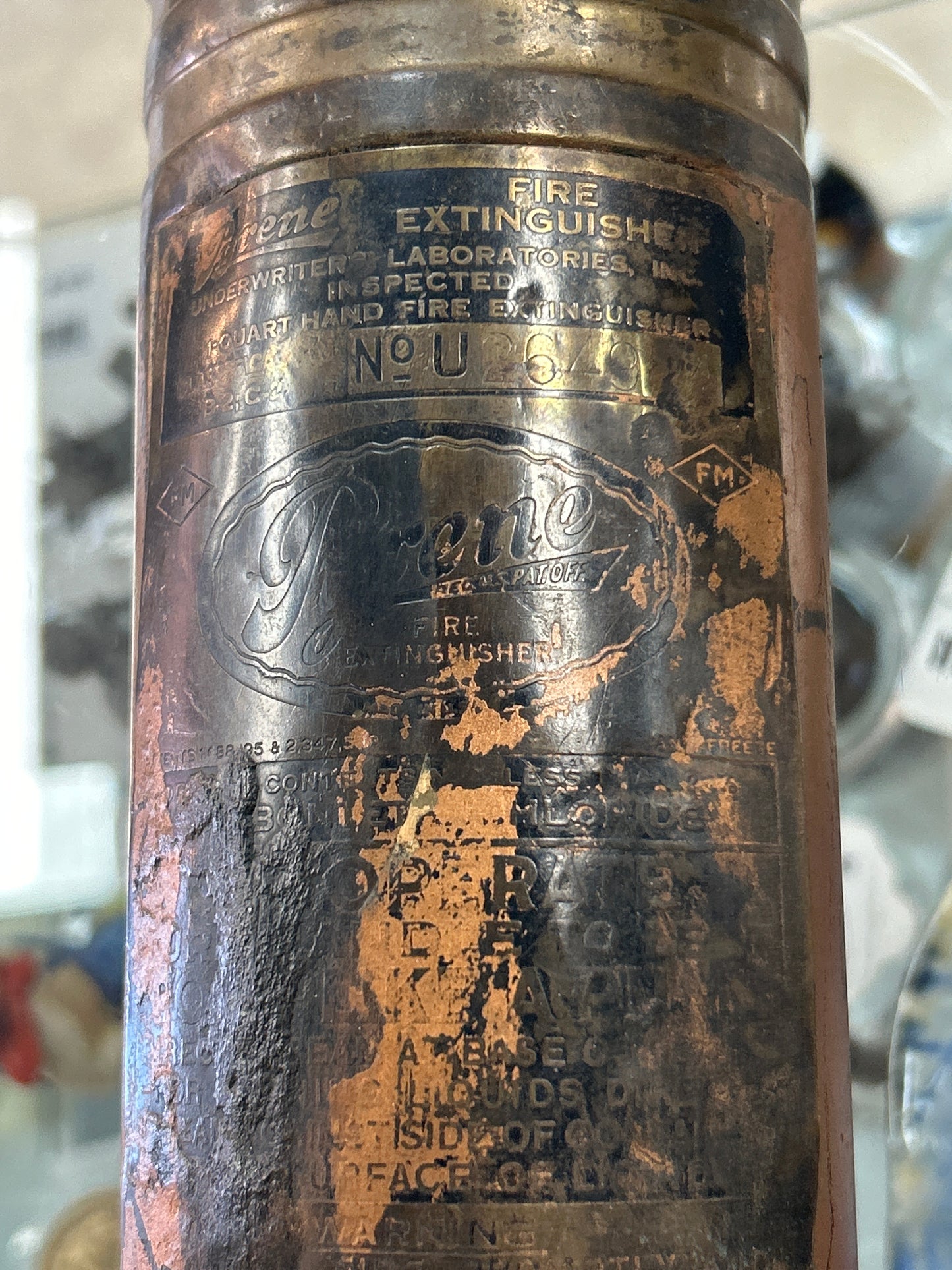 Vintage pump fire extinguisher w/ original wall mount