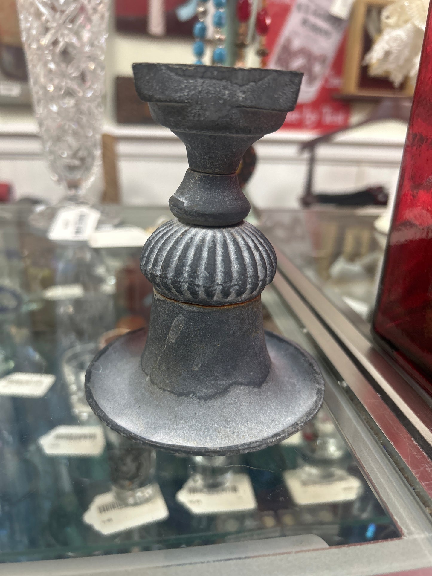 vintage-style cast iron candle holder