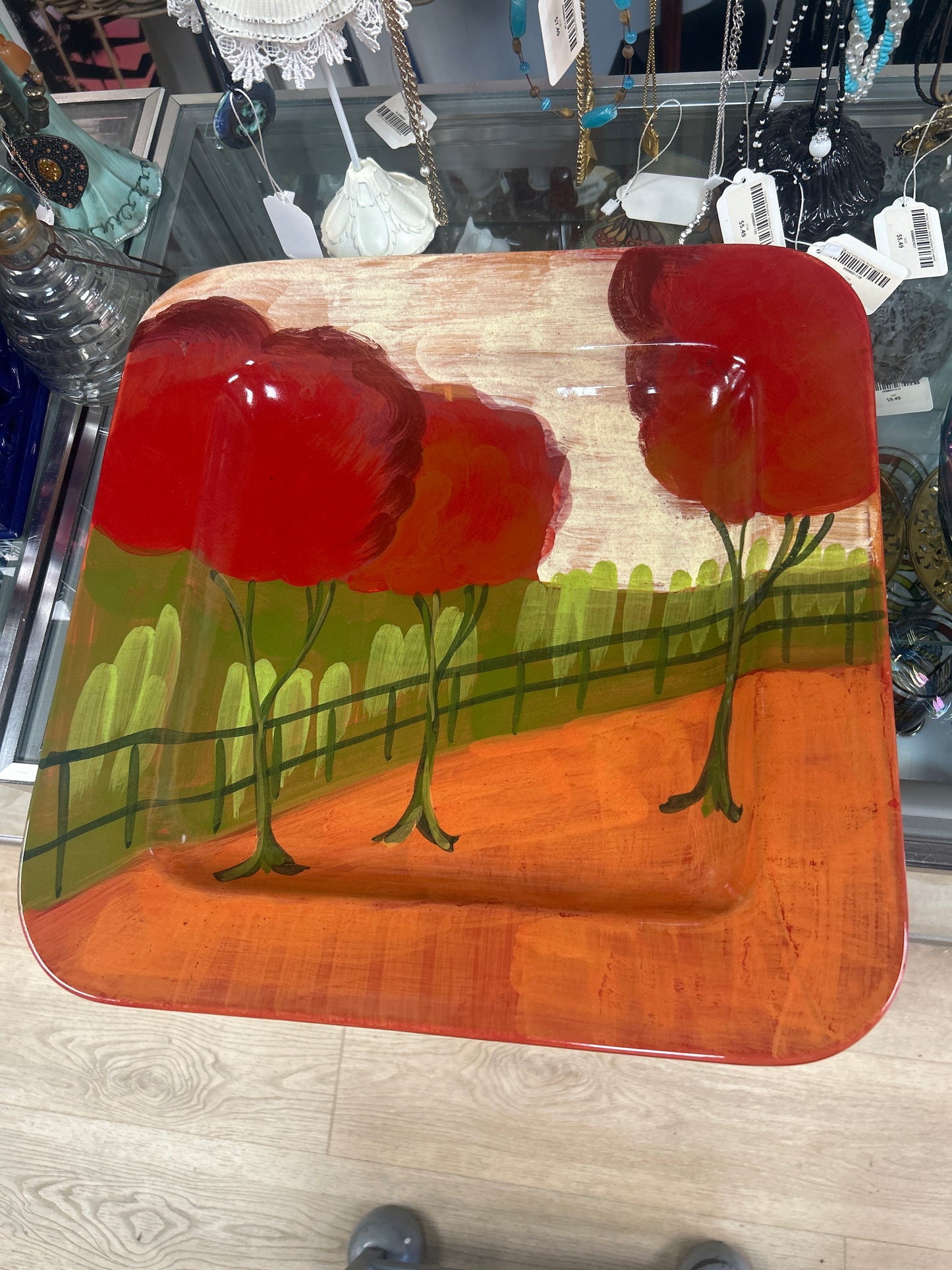Vietri Italian ceramic platter features a hand-painted Tuscan landscape with vibrant red trees
