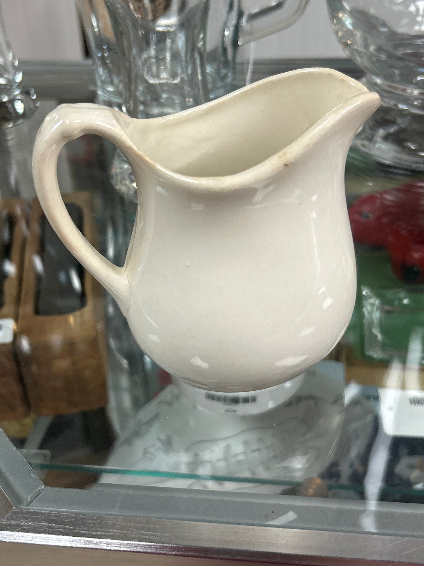 Antique pitcher 4.5” unmarked w/ light grazing and patina