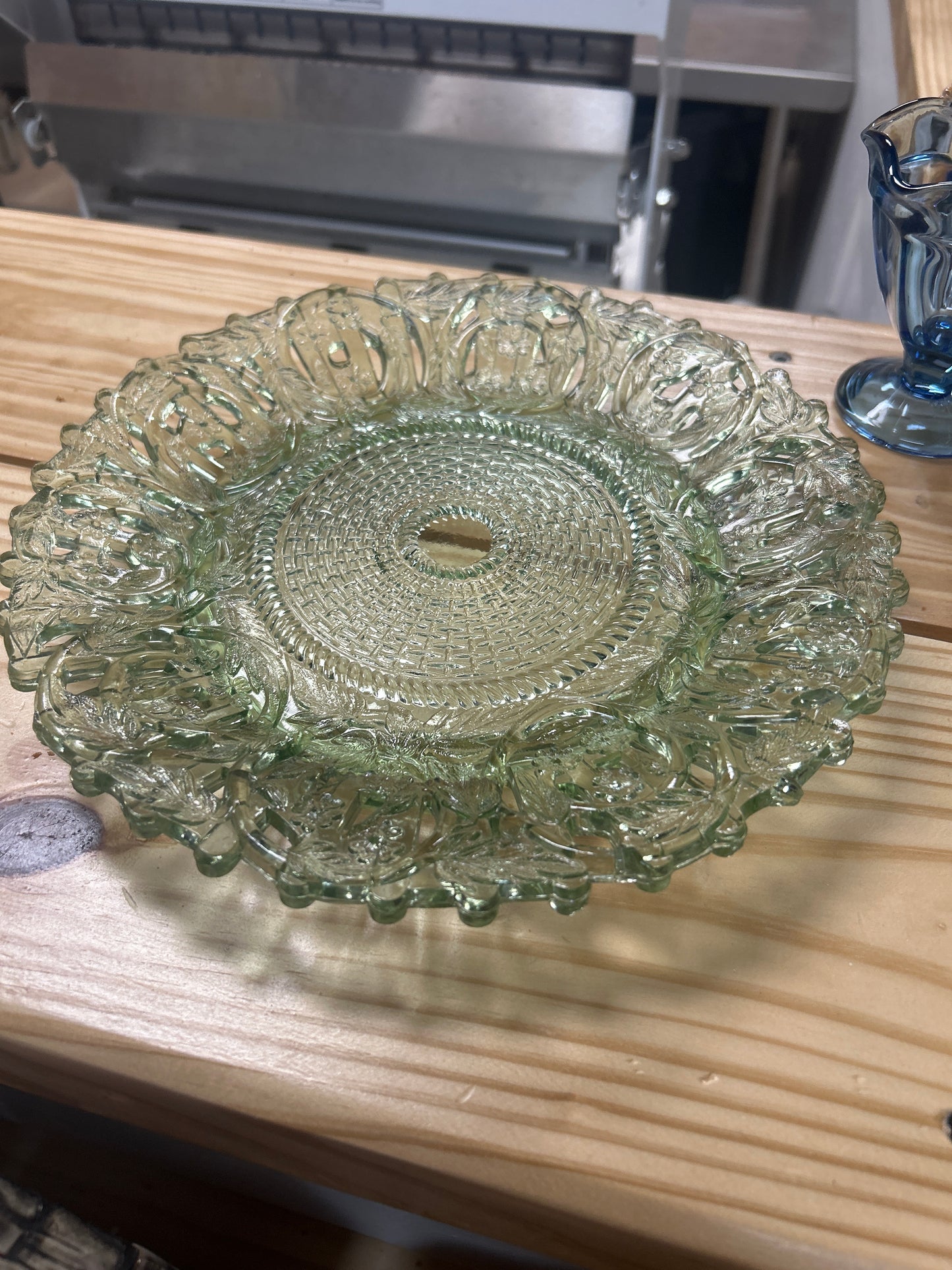 Rare depression glass plate with cut outs around floral design