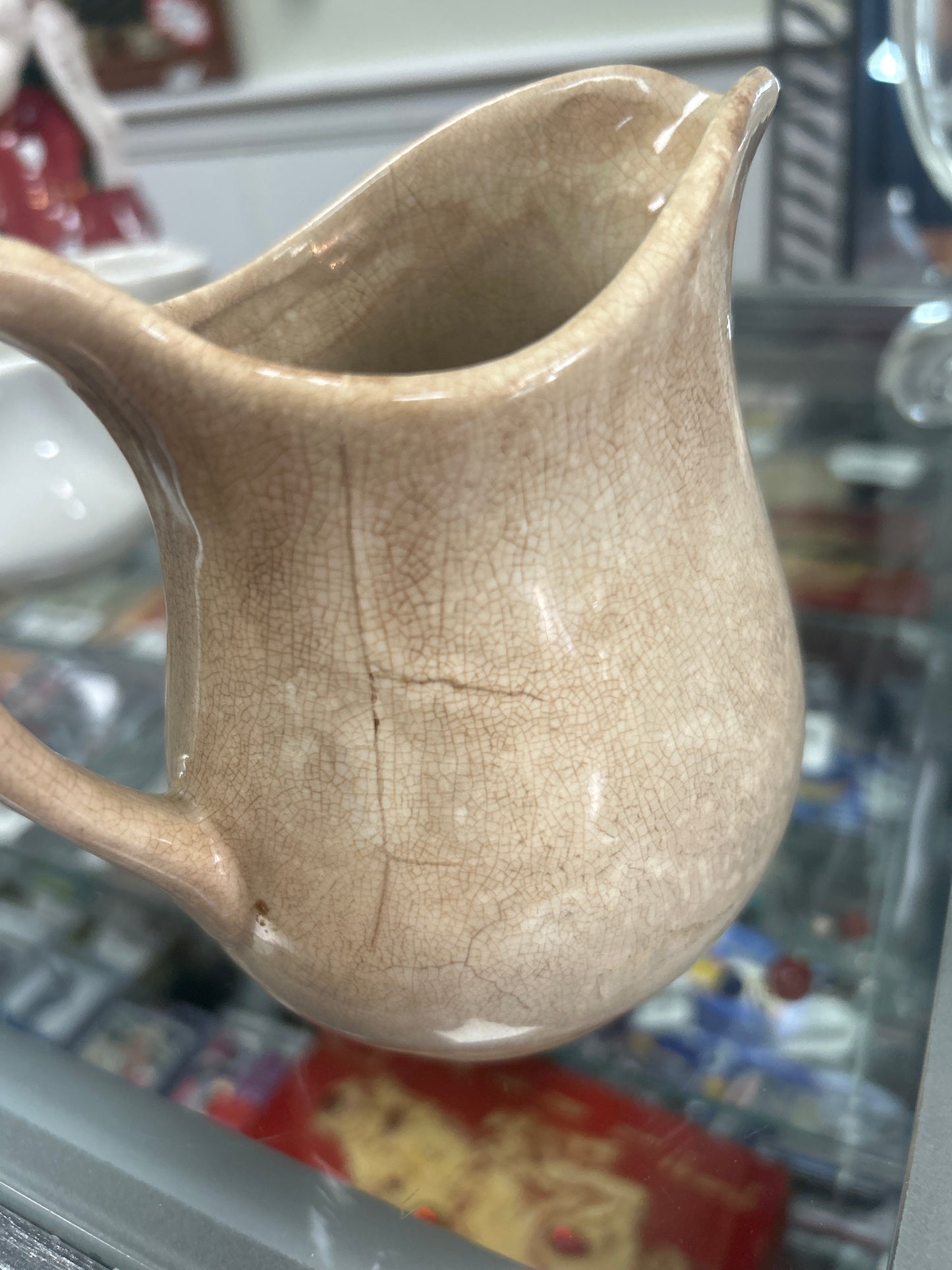 Antique ironstone pitcher with great browning and crazing; unmarked 5”