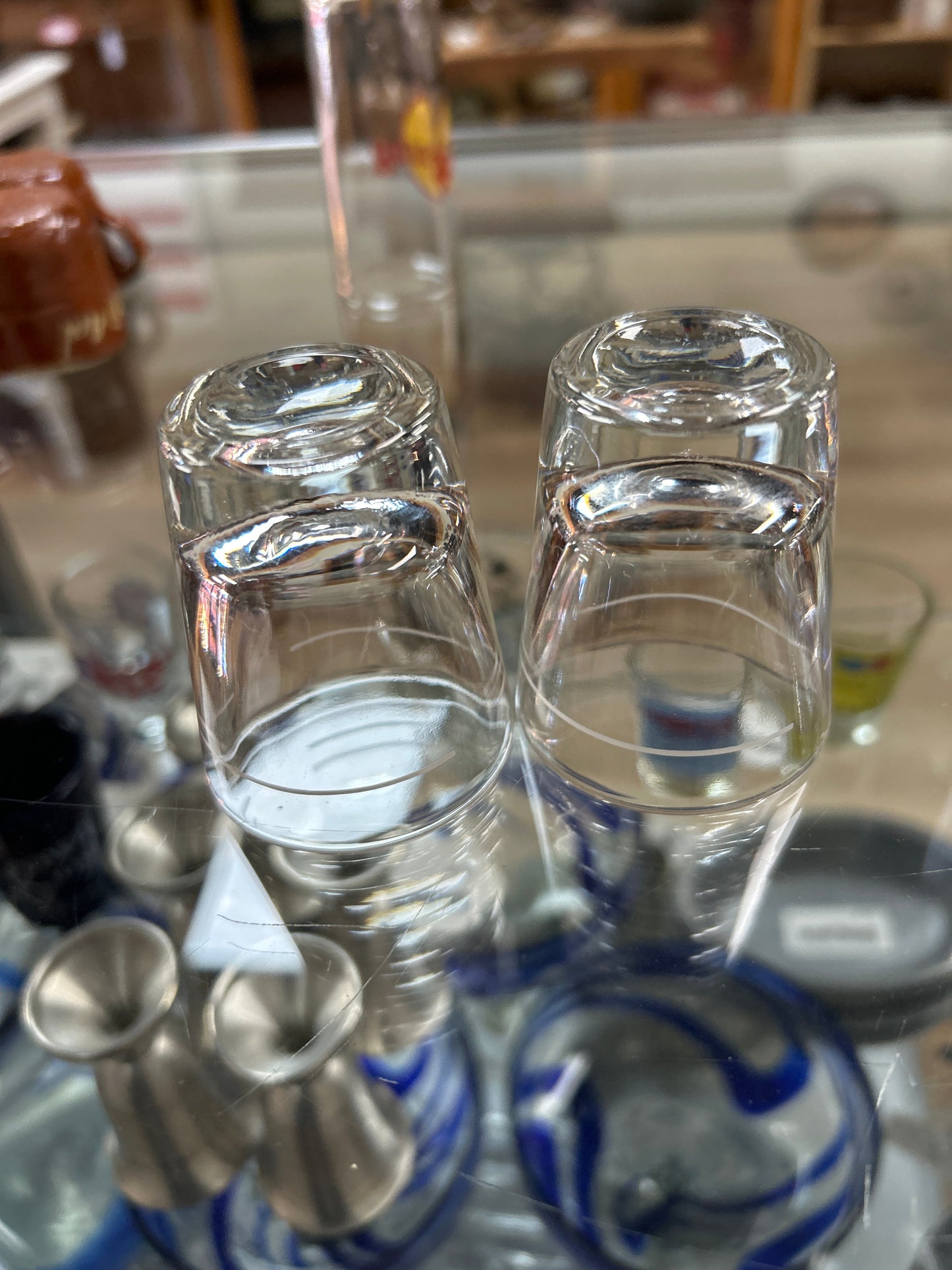 Pair of marked lined shot glasses