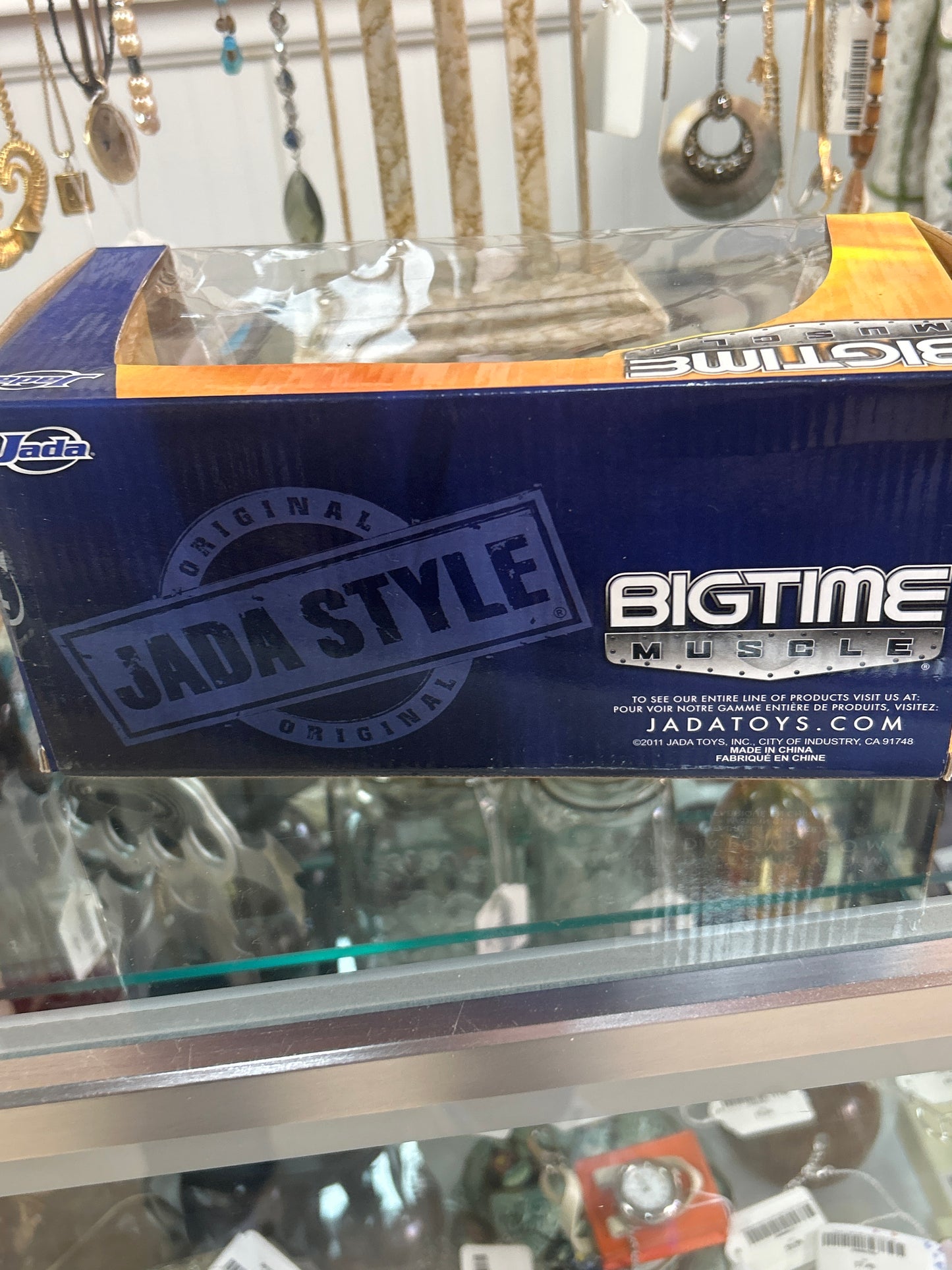 a "Bigtime Muscle" die-cast model car by Jada Toys. The specific model is a 2008 Dodge Challenger SRT8