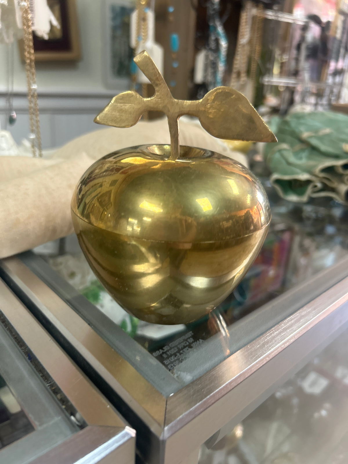 Lidded brass apple container