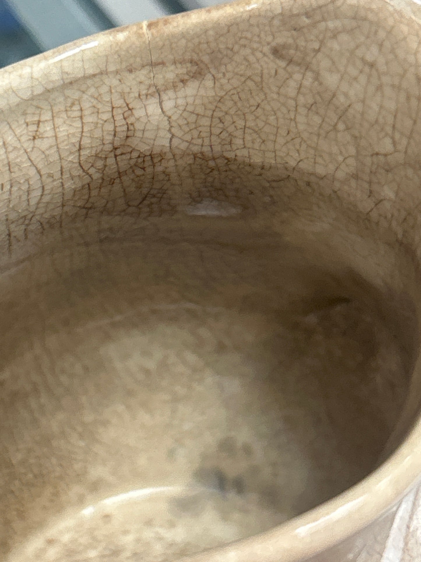 Antique ironstone pitcher with great browning and crazing; unmarked 5”