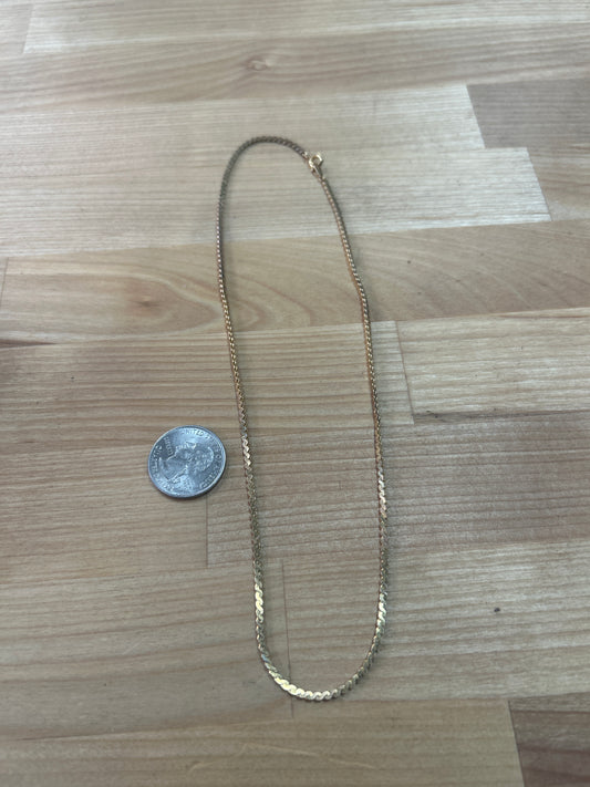 Gold tone necklace