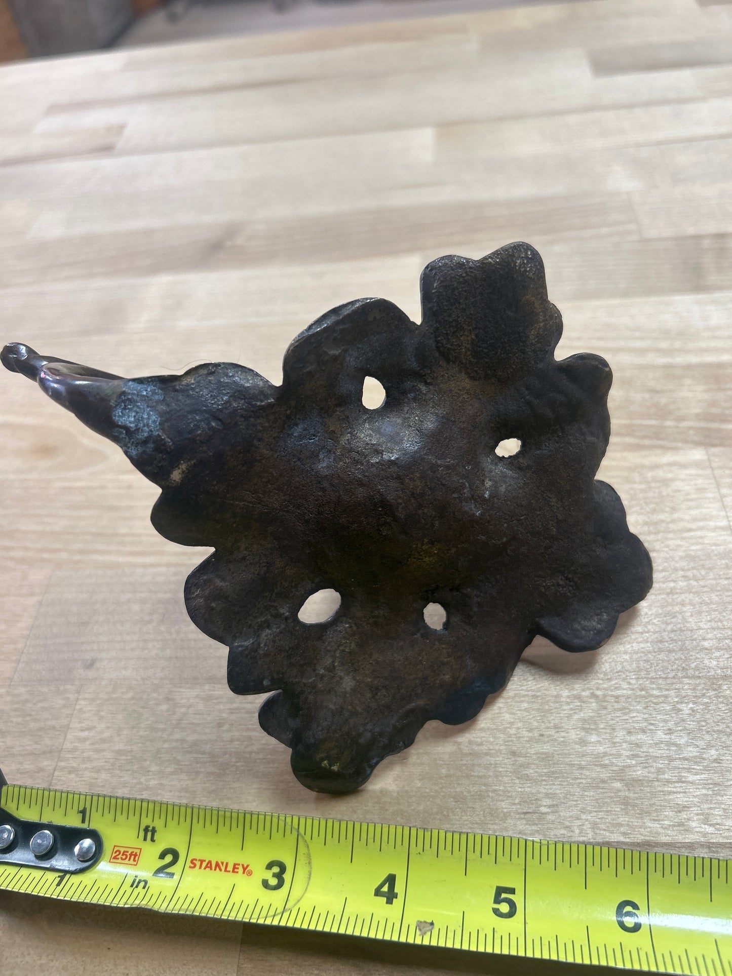BRONZE FLOWER CANDLE HOLDER WITH A HANDLE