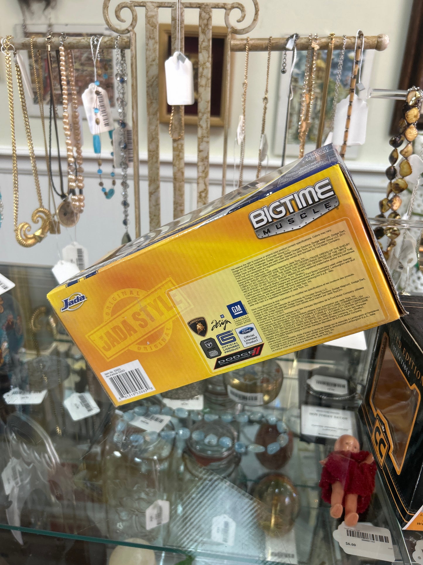 a "Bigtime Muscle" die-cast model car by Jada Toys. The specific model is a 2008 Dodge Challenger SRT8