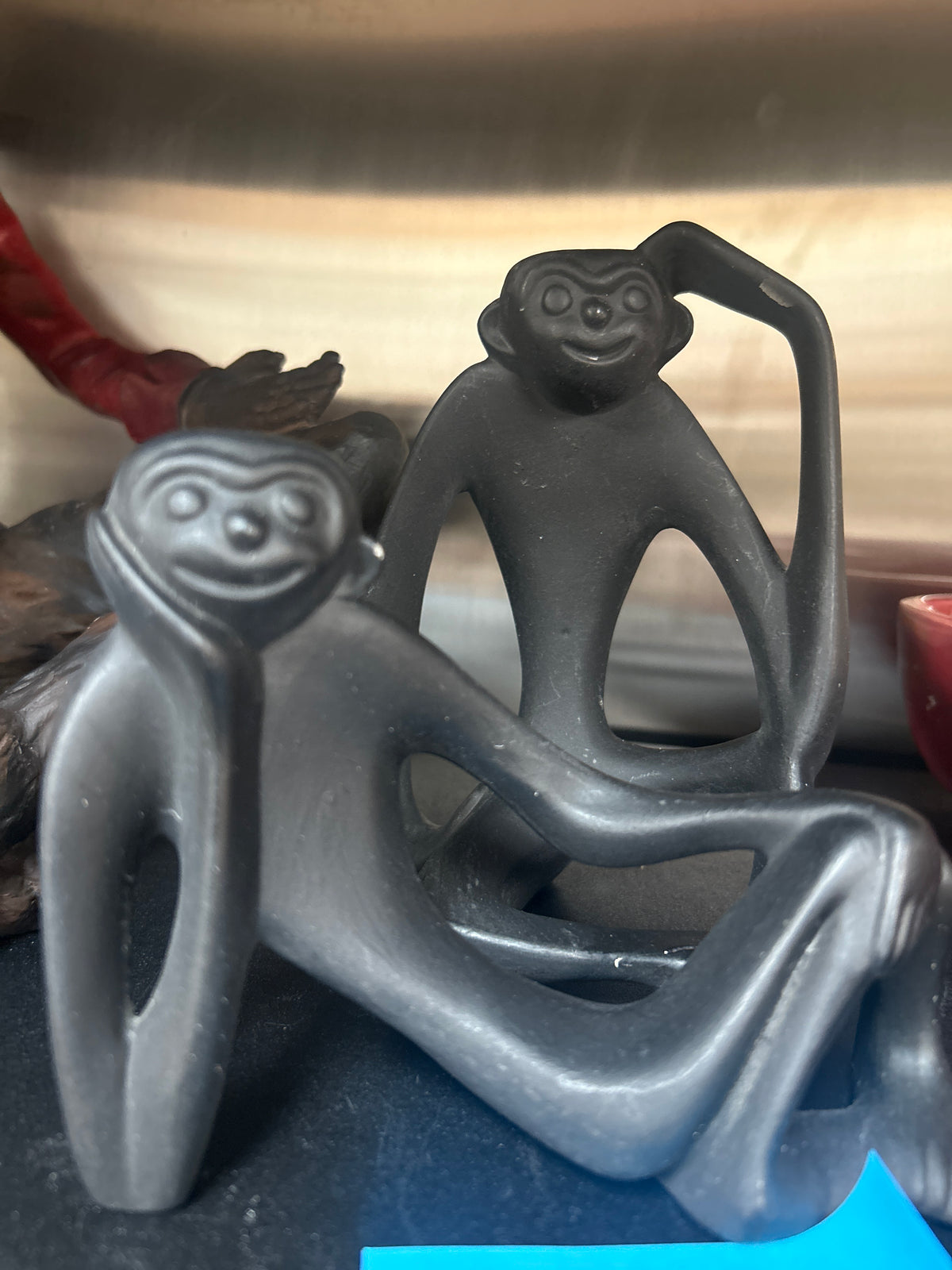 Black monkey figures mid-century modern sculptures