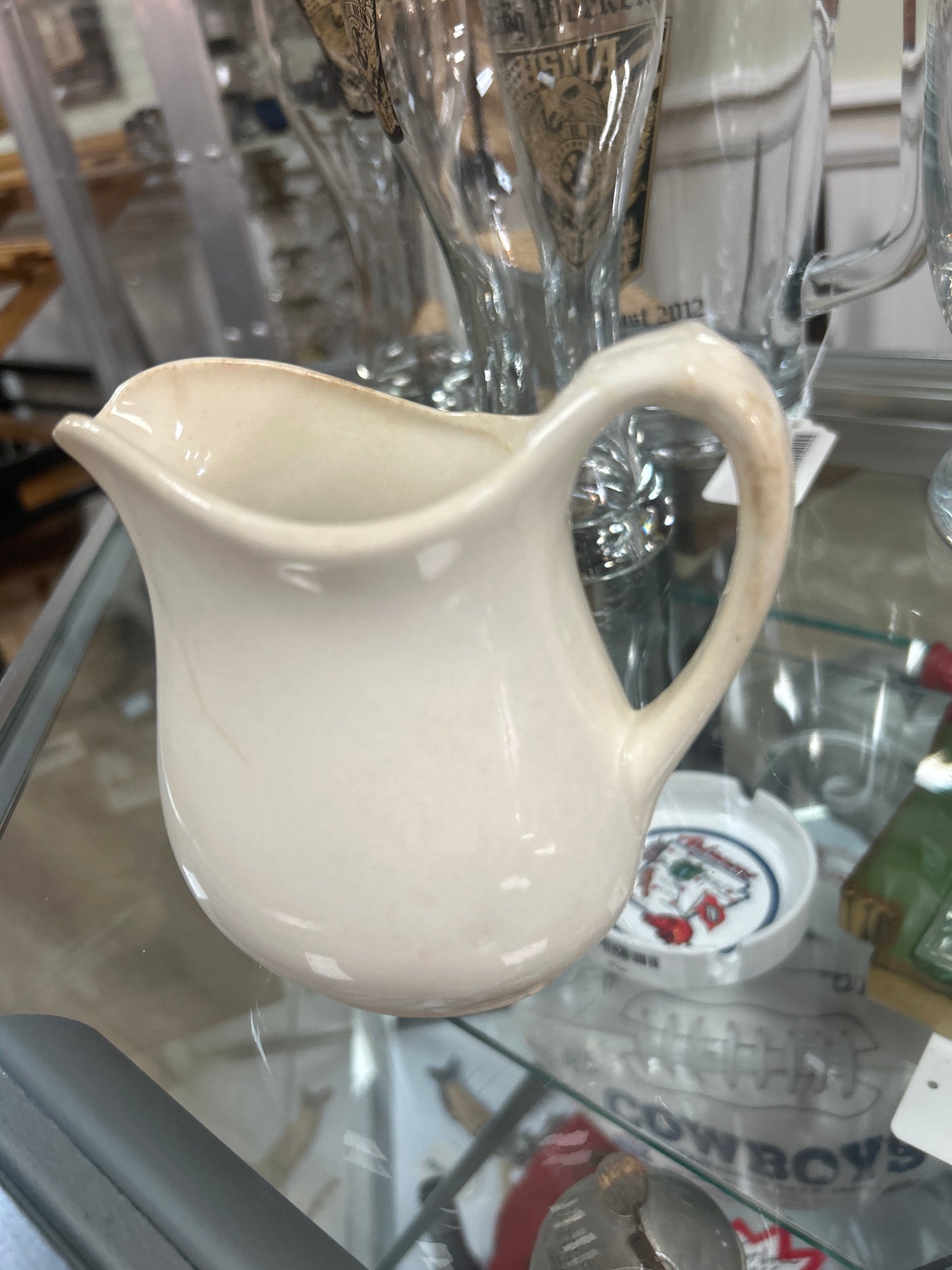 Antique pitcher 4.5” unmarked w/ light grazing and patina