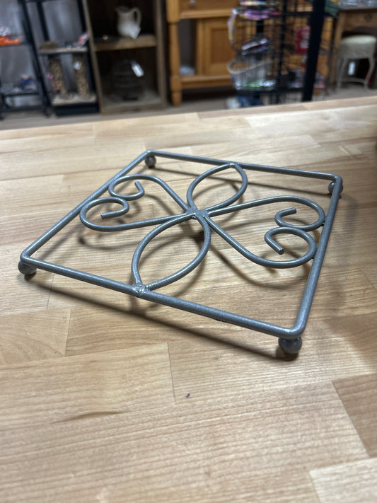 Gray trivet metal square