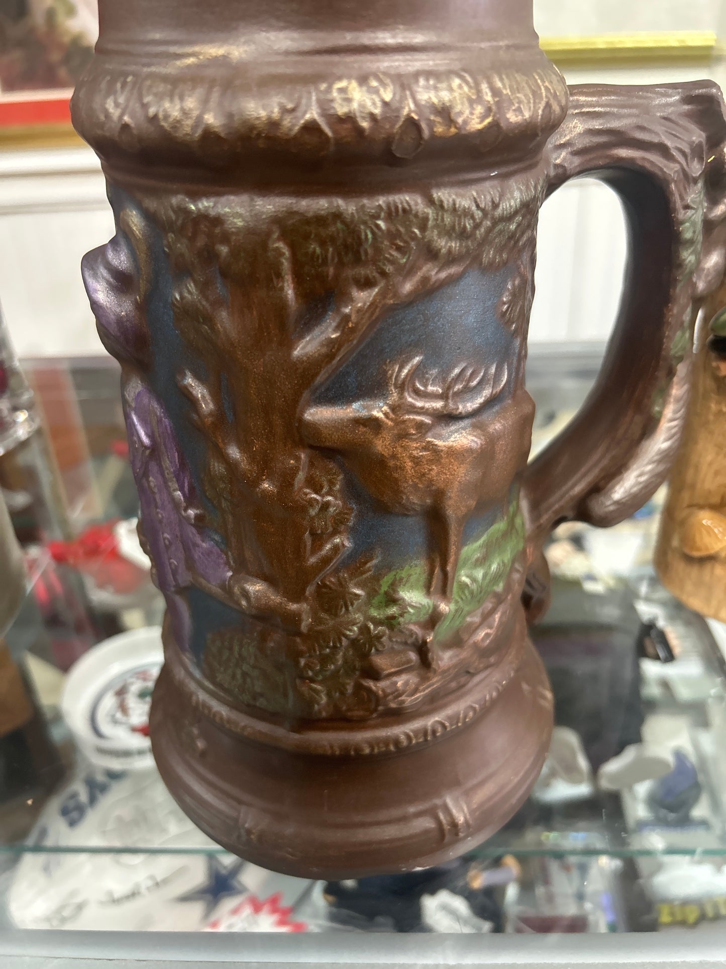 Large Vintage And Unique Ceramic Beer Stein With Man, Elk, Deer and Squirrel.