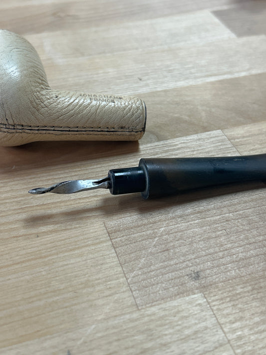 Vintage Longchamp leather pipe ( we don’t know anything about pipes. This may need a cleaning to fully insert mouth piece)