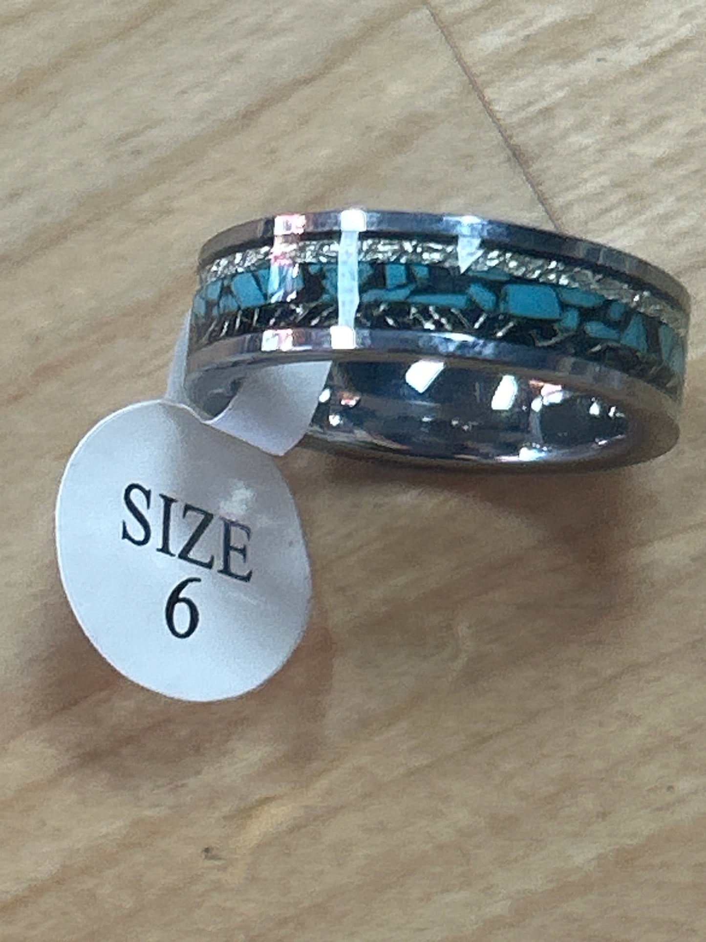 Light blue and black Ring size 6