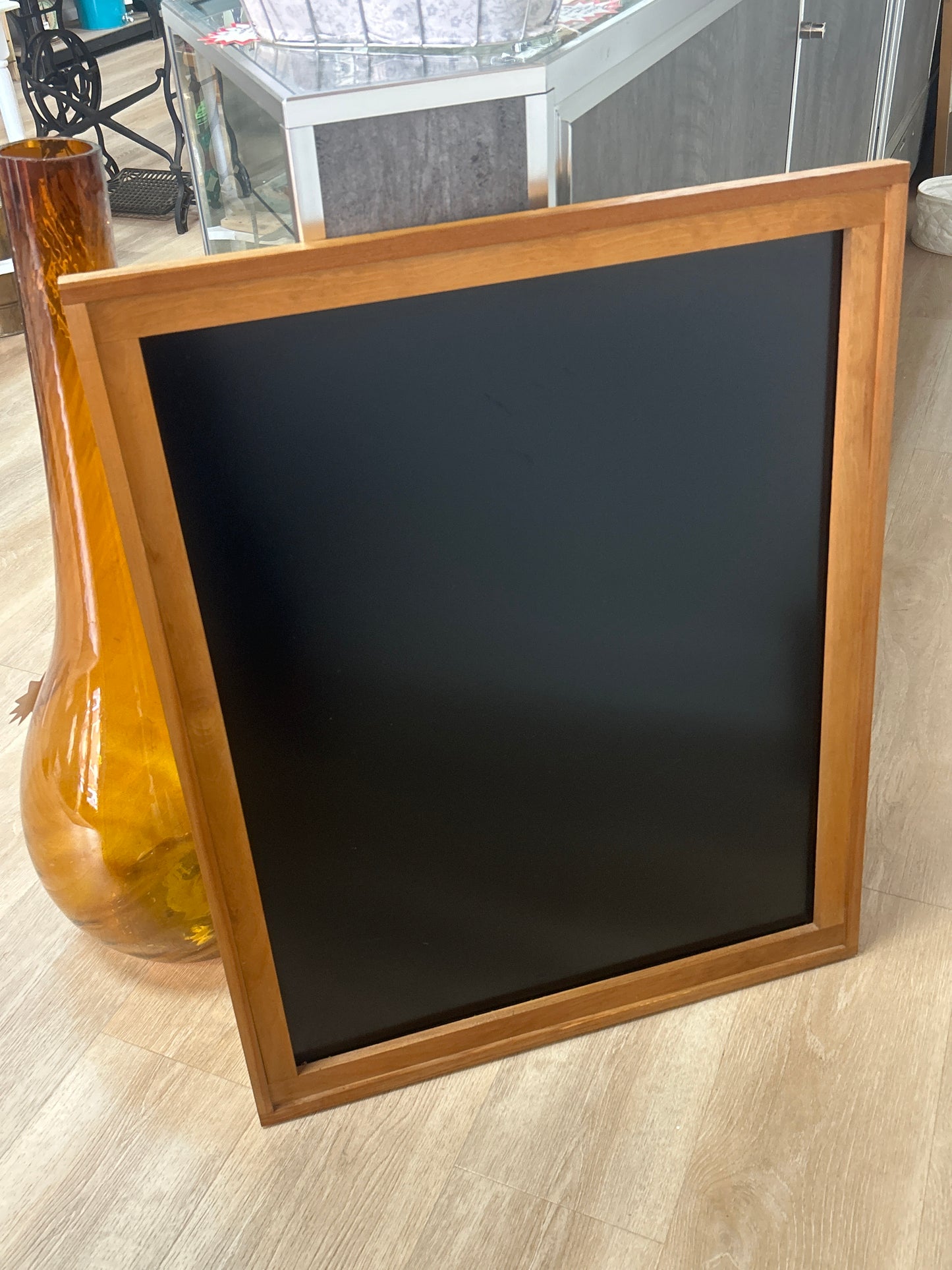 The Howard Company metal back wood frame displays 27.5”x34.5”