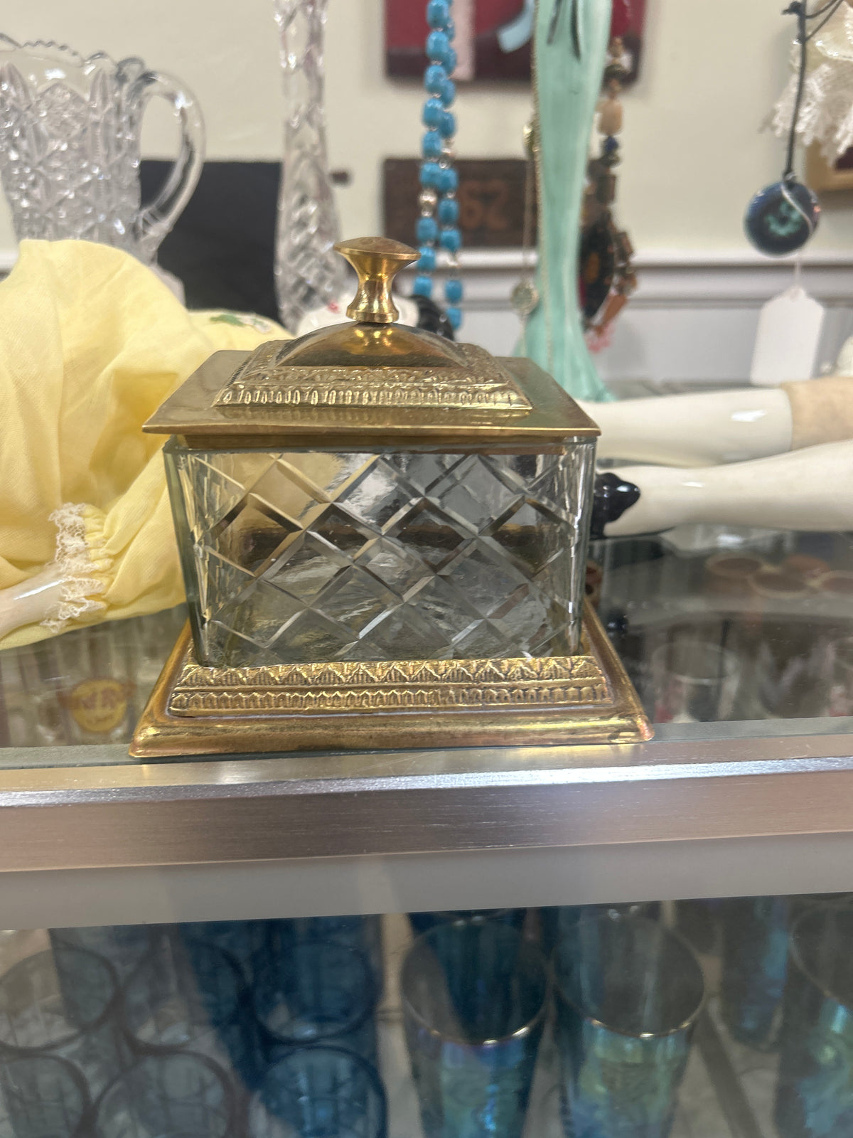 Vintage vanity or trinket box made of cut crystal with brass