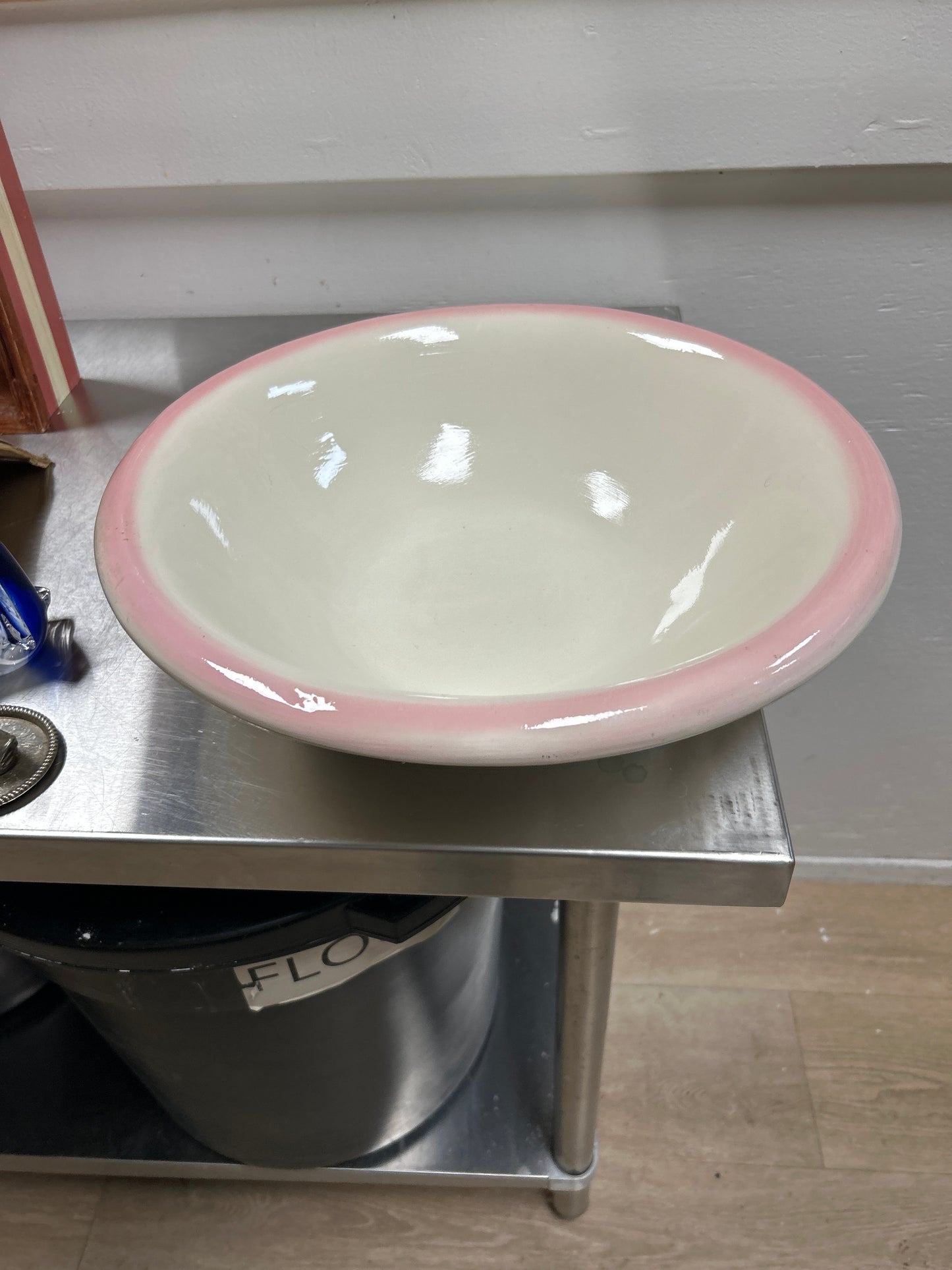 Pink and white wash basin