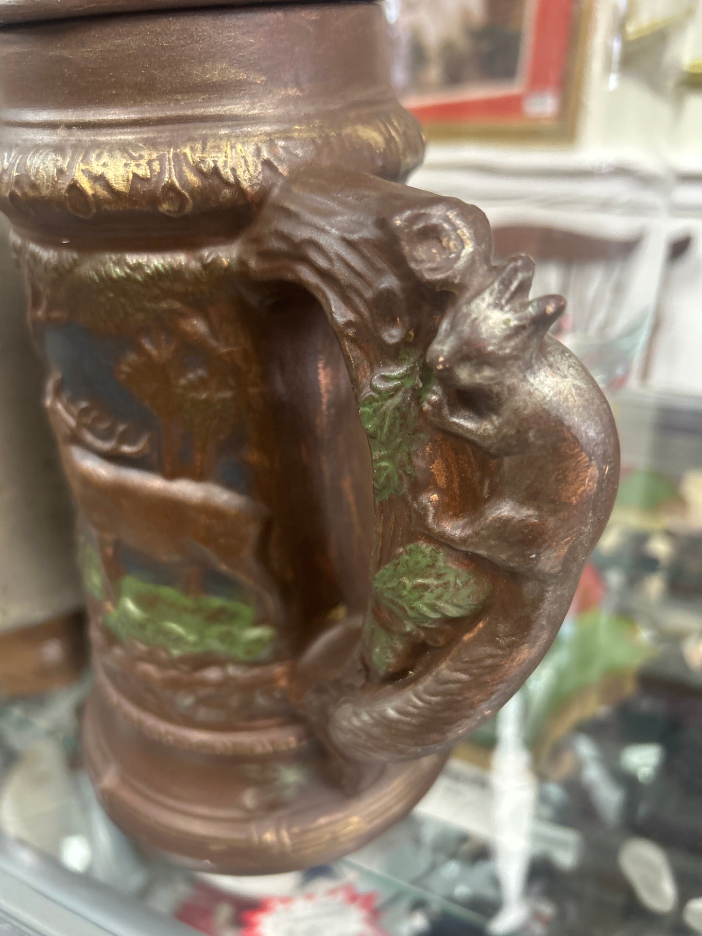 Large Vintage And Unique Ceramic Beer Stein With Man, Elk, Deer and Squirrel.