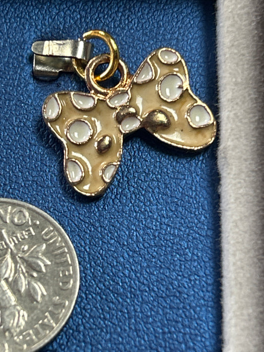 Charm (yellow bow)