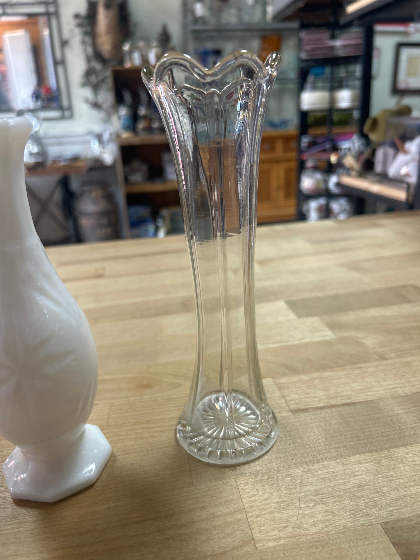Small Clear Bud Vase 7.75” (small chip on bottoms