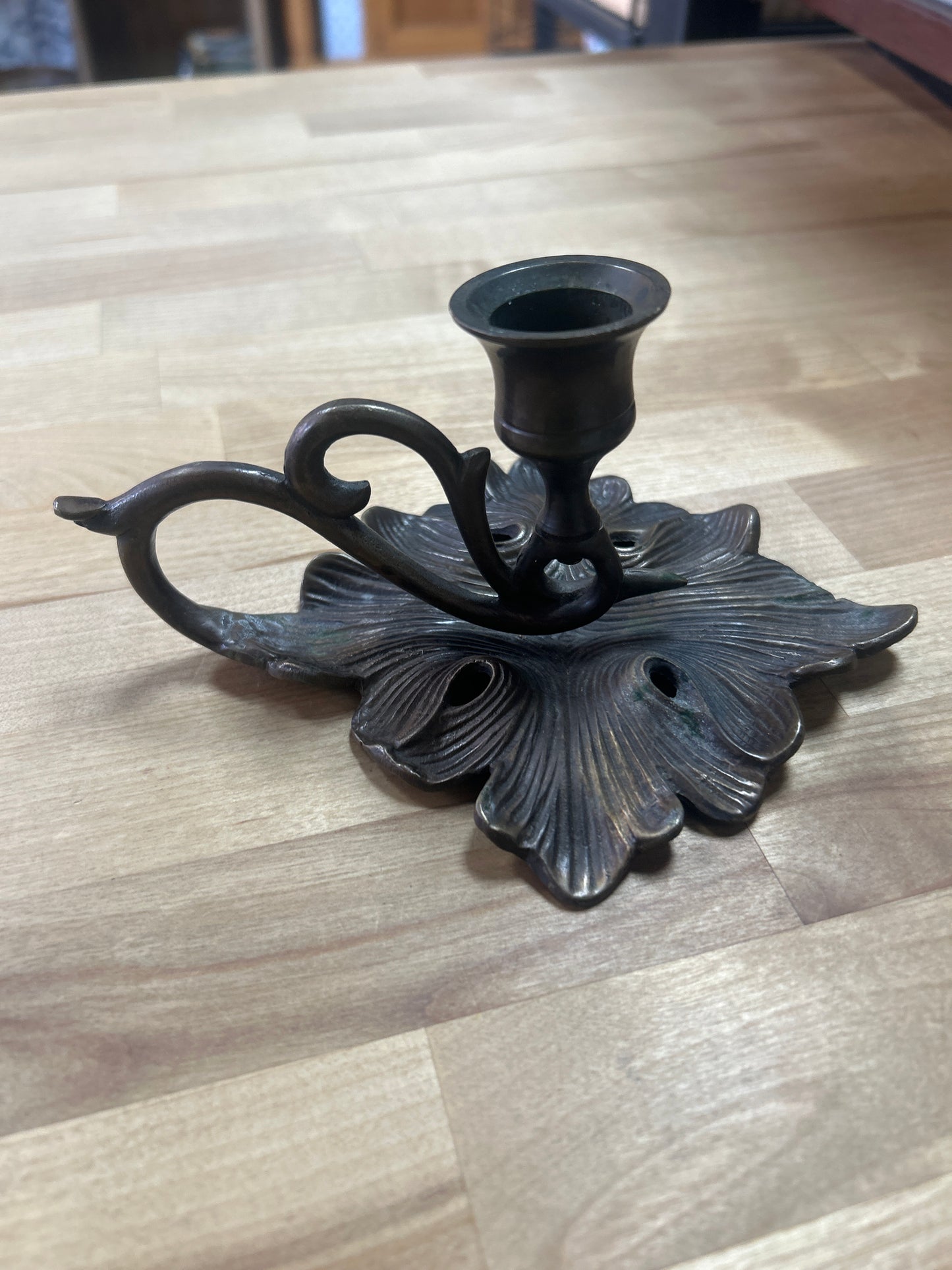 BRONZE FLOWER CANDLE HOLDER WITH A HANDLE