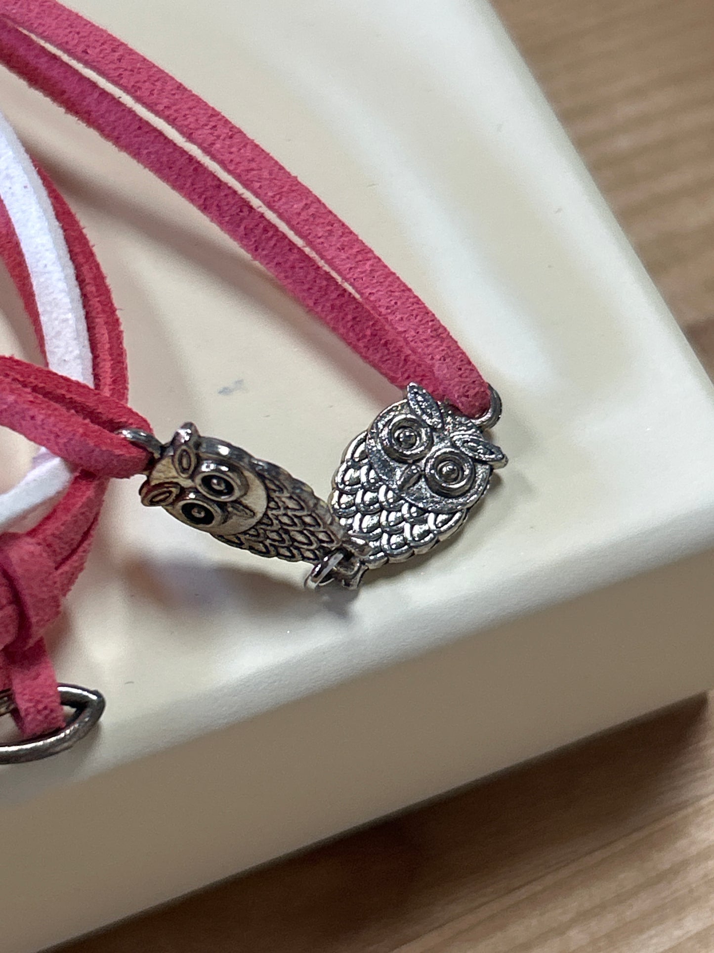 Pink and white charm bracelet