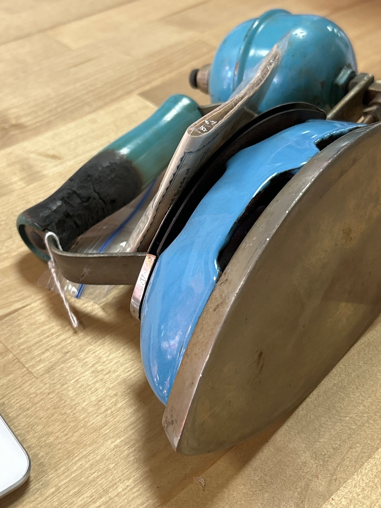 Coleman Model 4A Self-Heating Iron w/ instructional pamphlet (burnt handle)