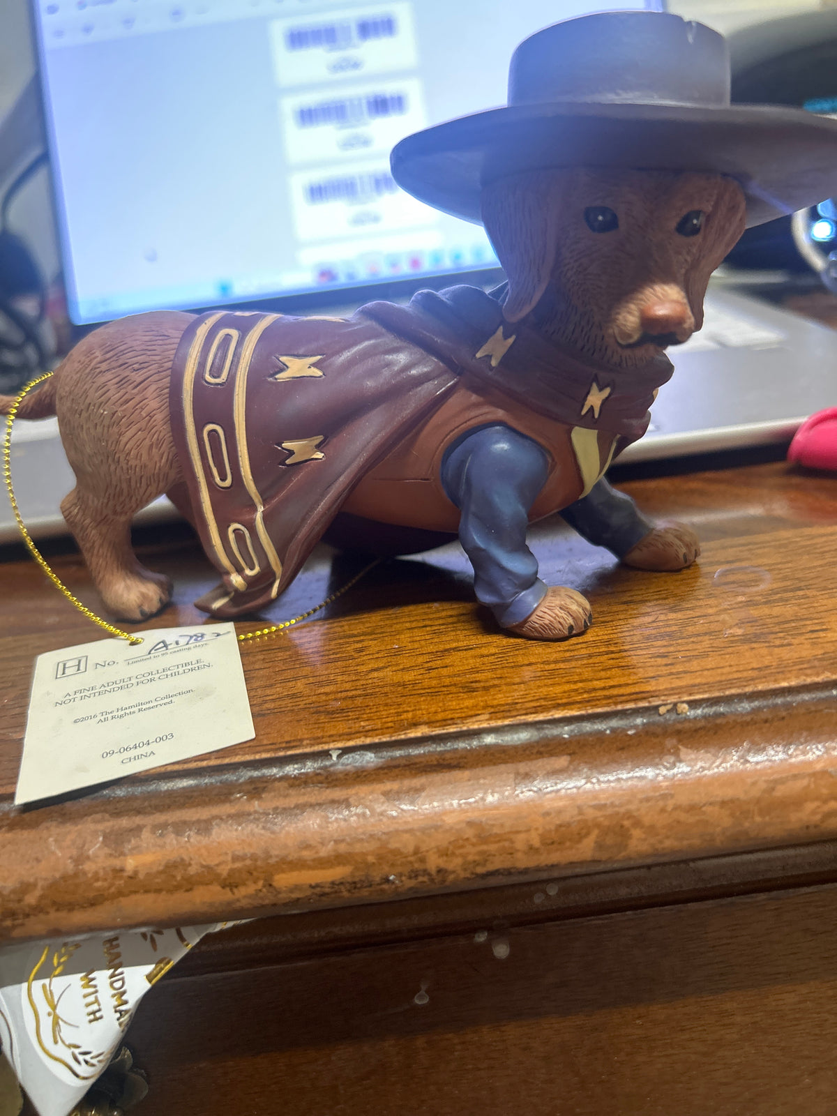 A Paw-Fect Hero" cowboy dachshund figurine Hamilton