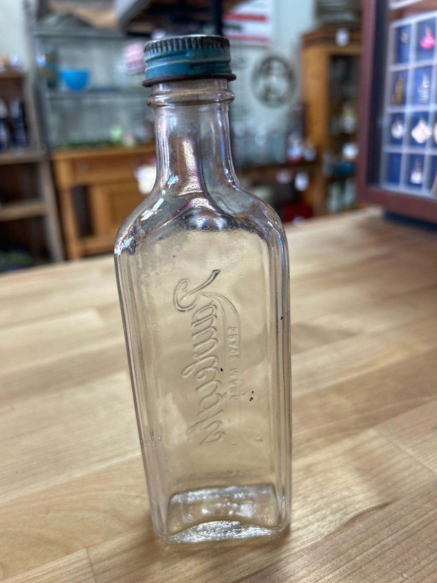 Vintage Rawleigh’s Empty Bottle w/ lid