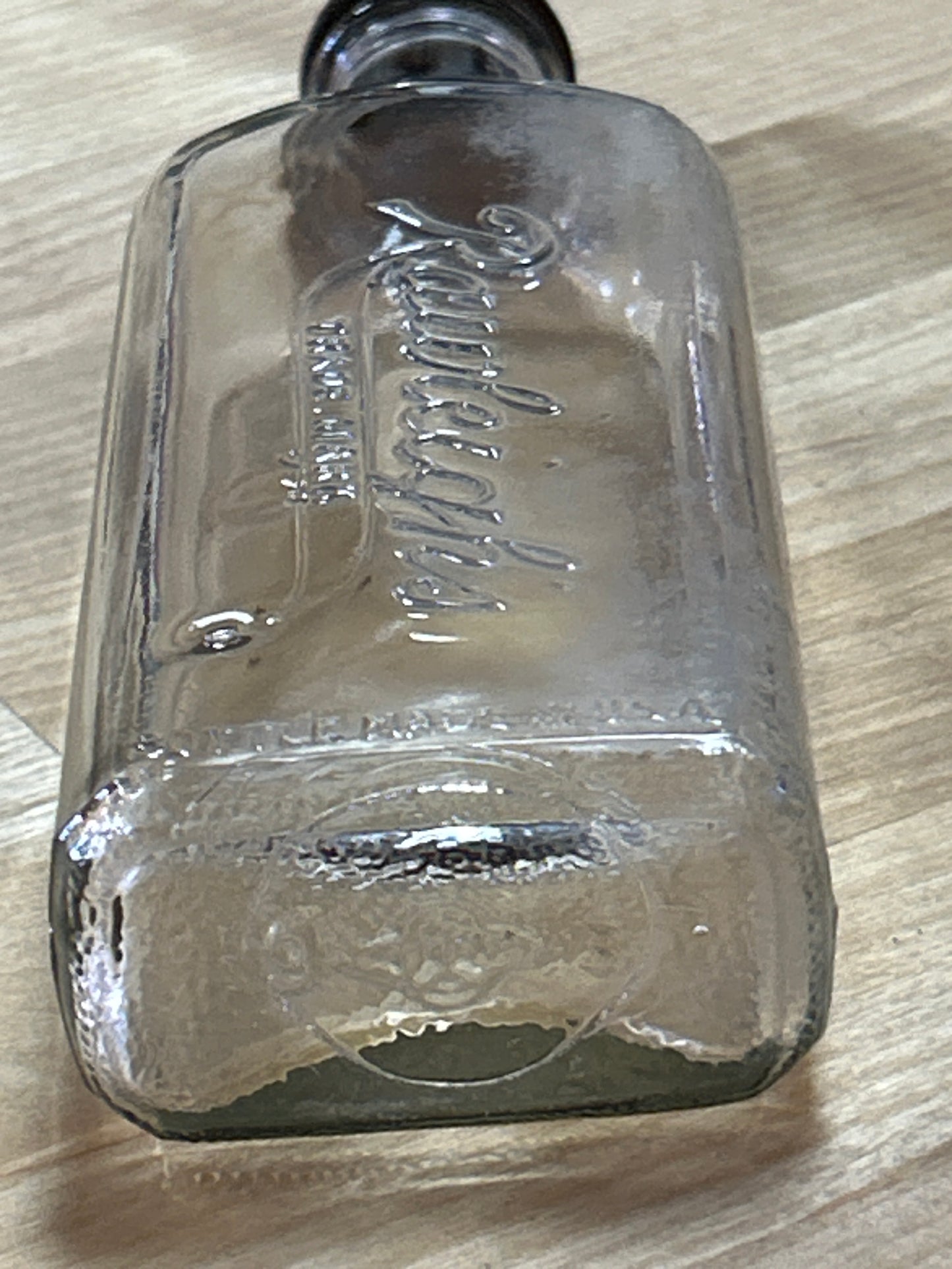 Vintage Rawleigh’s Empty Bottle w/ lid