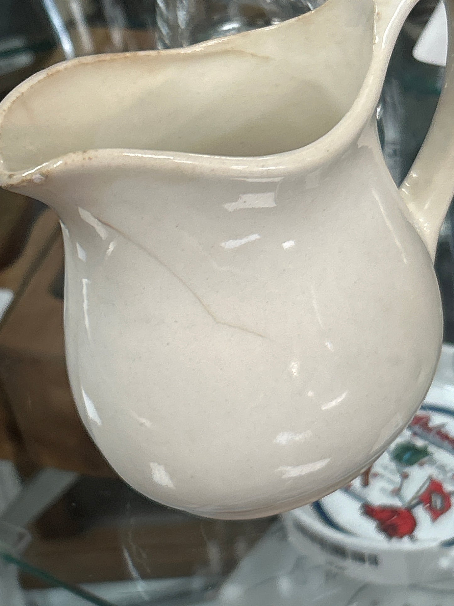 Antique pitcher 4.5” unmarked w/ light grazing and patina