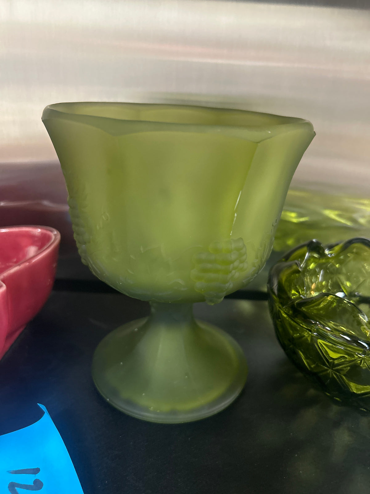 Indiana Glass compote dish in a frosted avocado green color